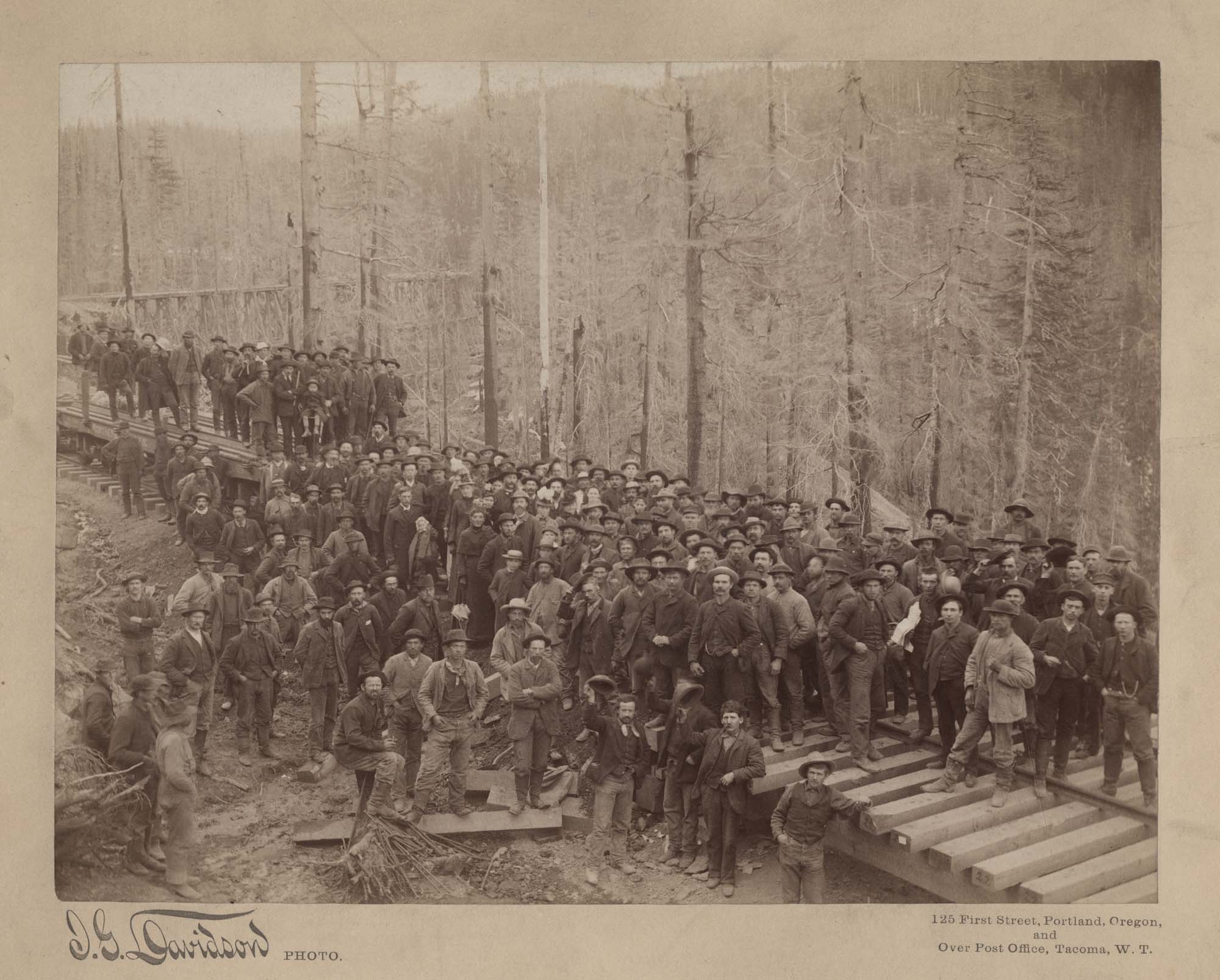 Image of Large group of people at Stampede Pass Tunnel, circa 1888