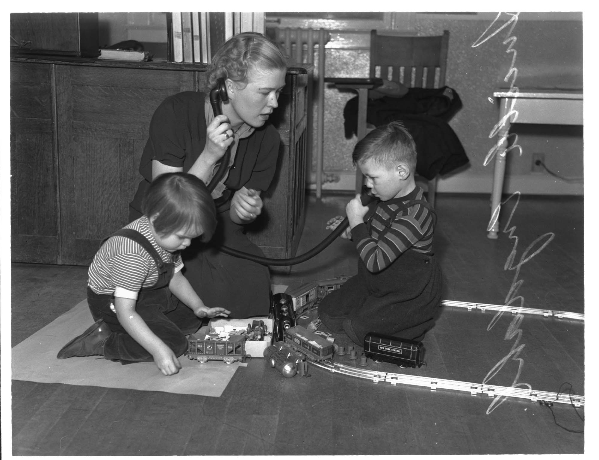 Image of Lucille Engdahl working with deaf children, University of Washington Speech Clinic, Seattle, 1939