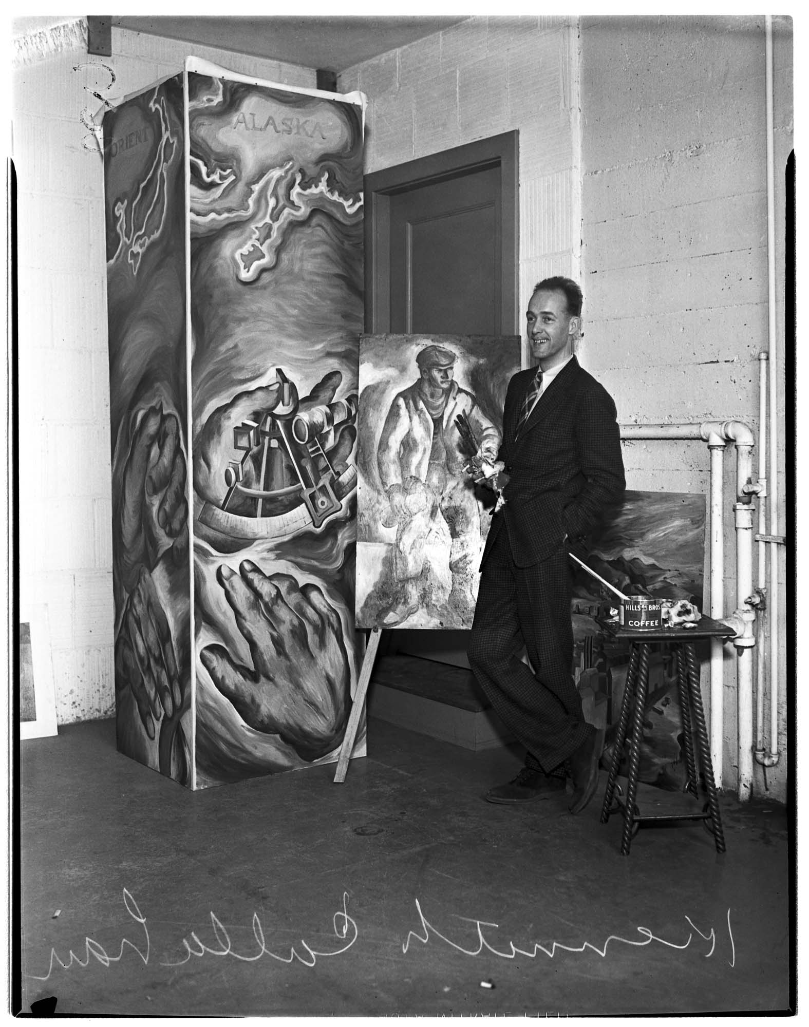 Image of Kenneth Callahan with some of his paintings, Seattle, 1937