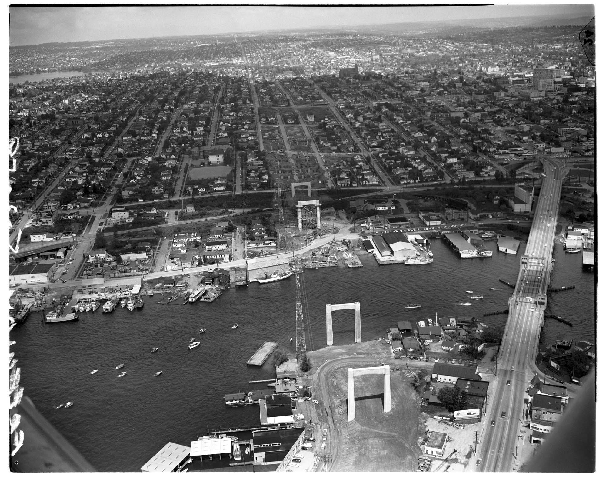 Image of Aerial view looking north from the freeway bridge under construction, Seattle, 1959