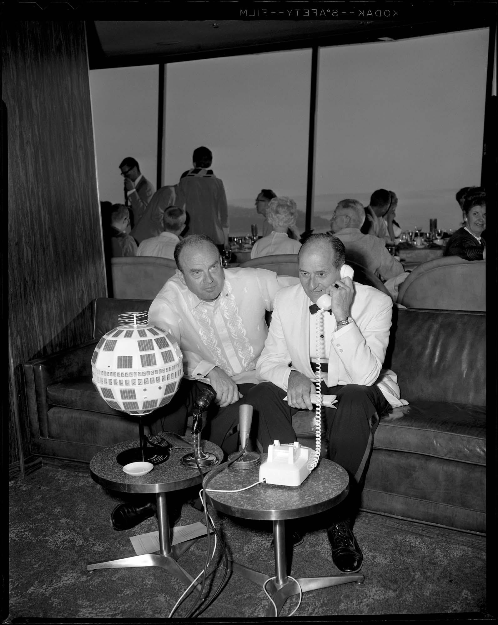 Image of Albert Rosellini and Ewen Dingwall inside Space Needle restaurant, Seattle, 1962