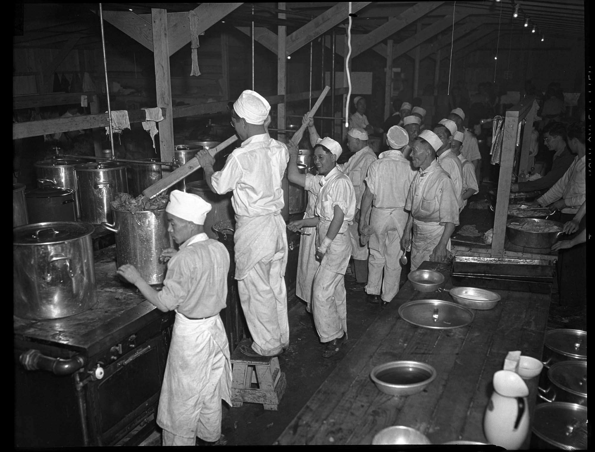 Image of Cooks in the mess hall at the Puyallup Assembly Center, Puyallup, 1942