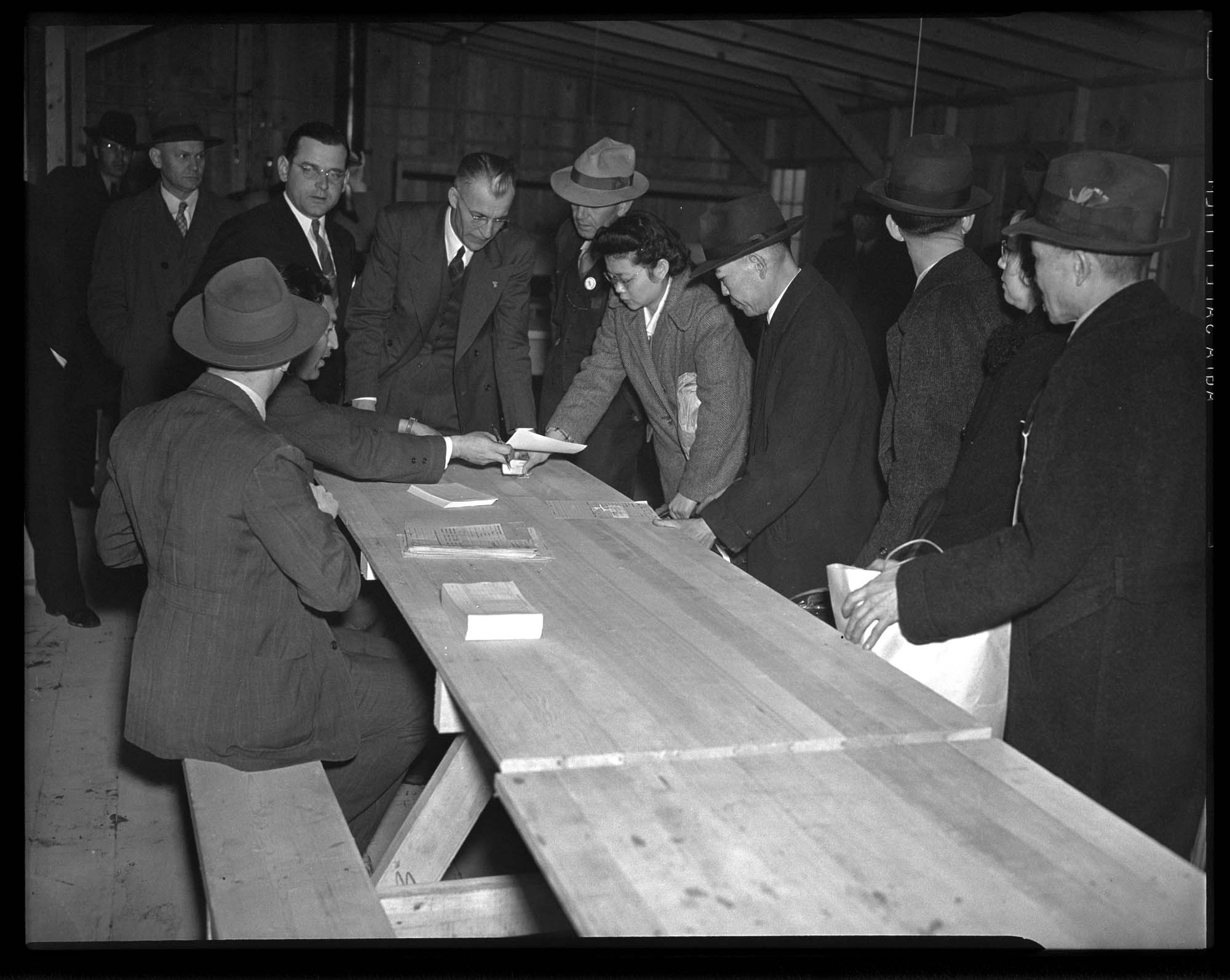 Image of Incarcerees registering at the Puyallup Assembly Center, Puyallup, 1942