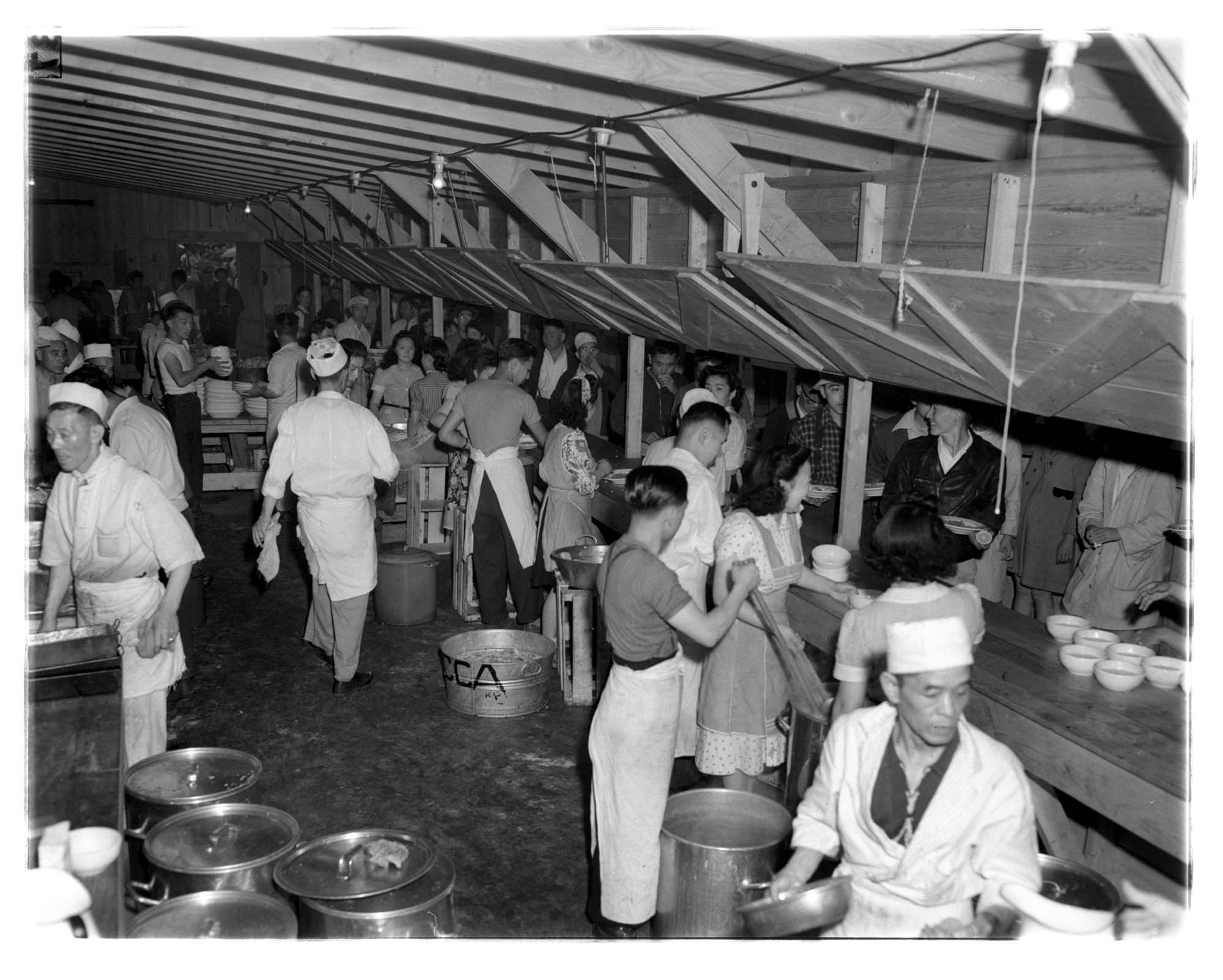 Image of Incarcerees working in kitchen at the Puyallup Assembly Center, Puyallup, 1942