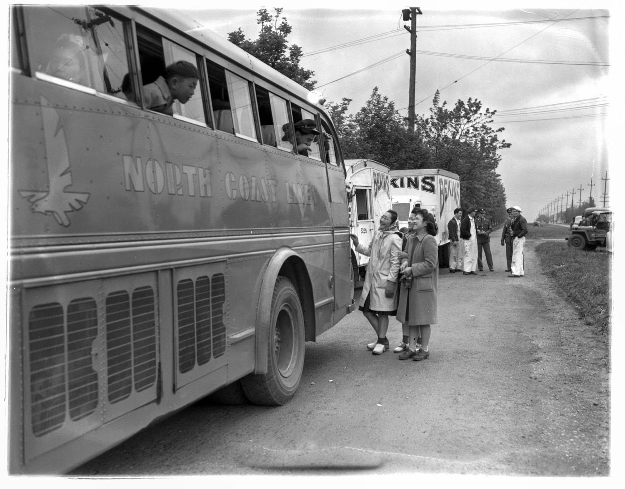 Image of Busload of incarcerees arriving at the Puyallup Assembly Center, Puyallup, 1942