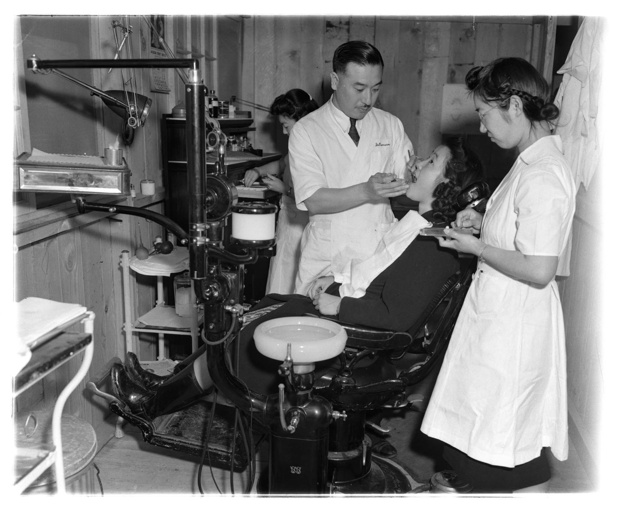 Image of Woman receiving dental care at the Puyallup Assembly Center, Puyallup, 1942