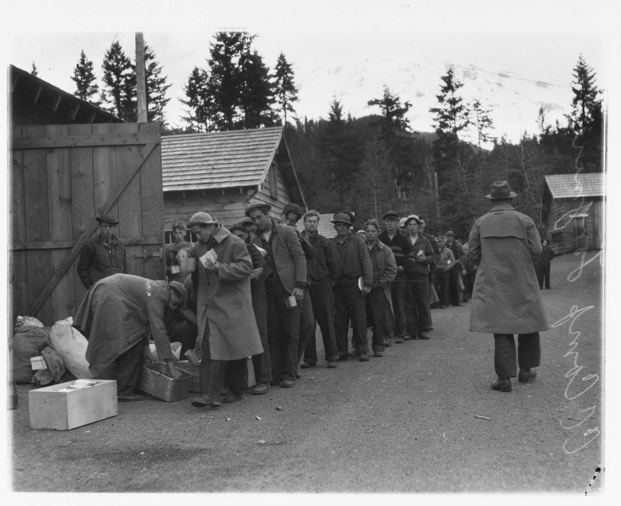 Image of Men outside barracks, Civilian Conservation Corps, Longmire, circa 1937