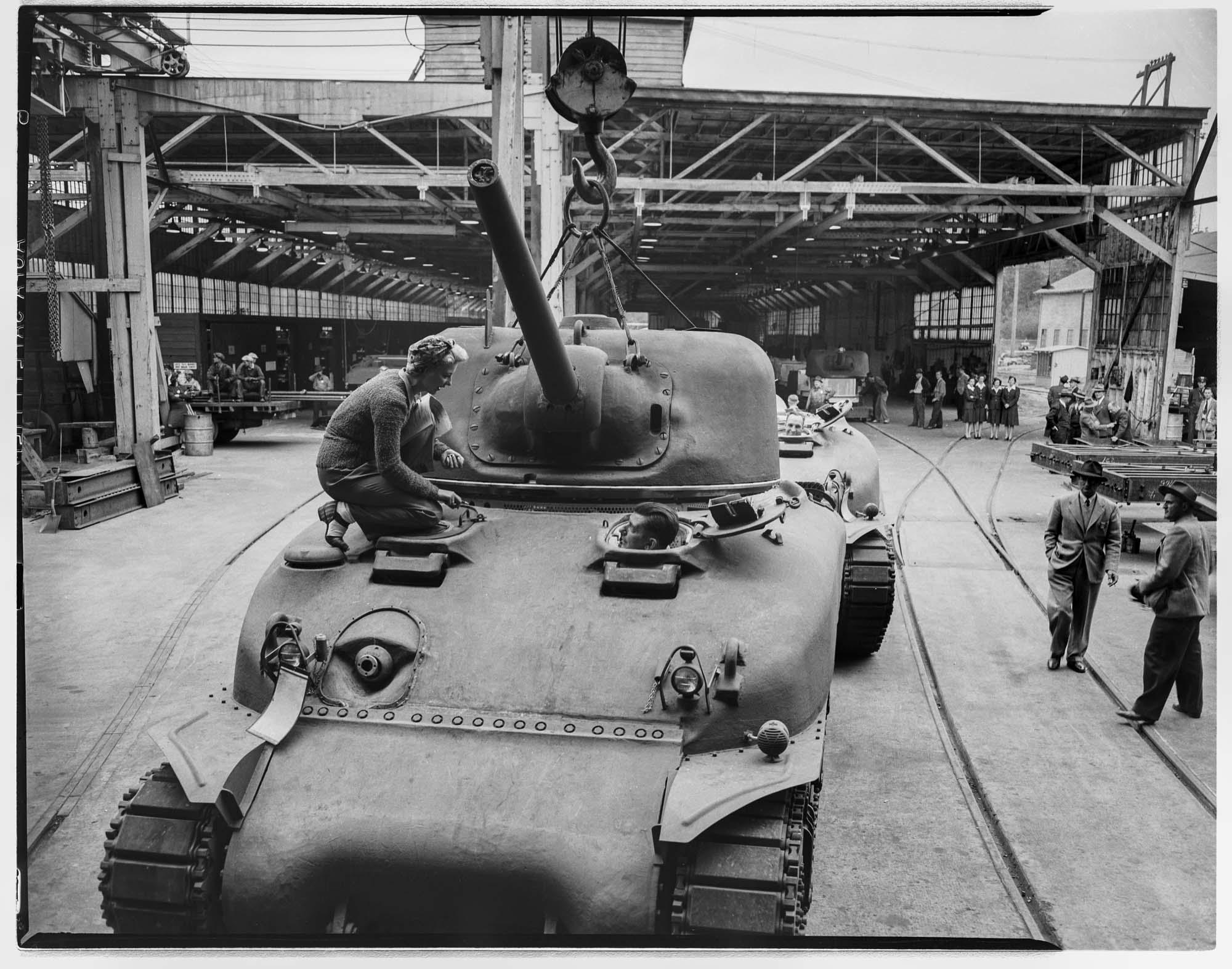 Image of Woman working on a tank, Pacific Car and Foundry company, Renton, 1943