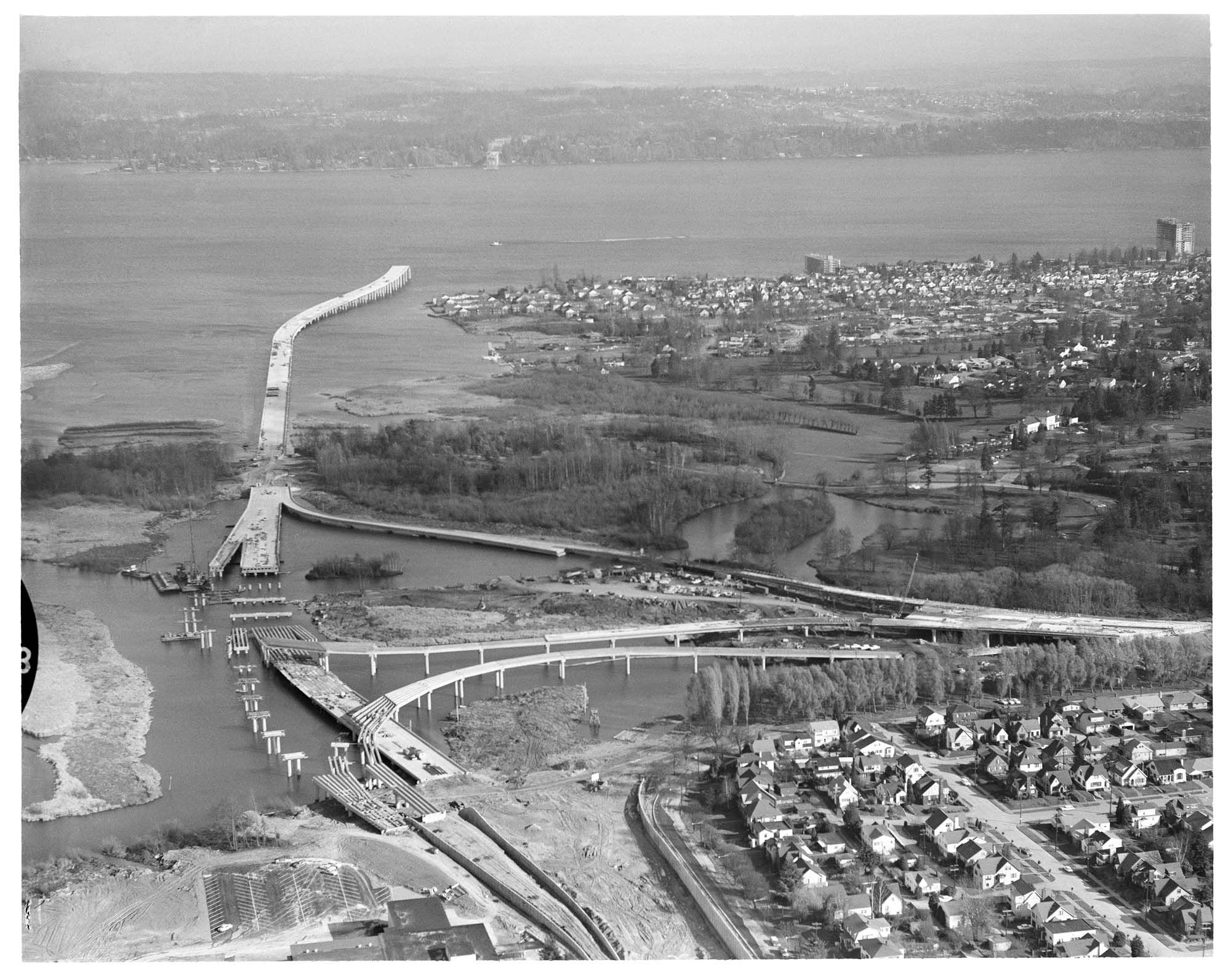 Image of Aerial of Evergreen Point Bridge under construction from west, Seattle, 1963