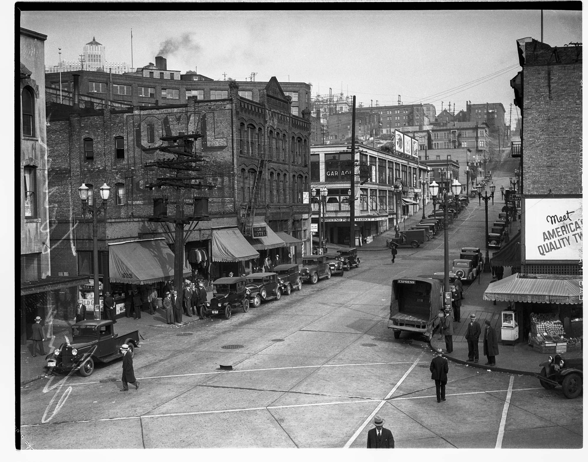Image of Chinatown street scene looking northeast, Seattle, 1934