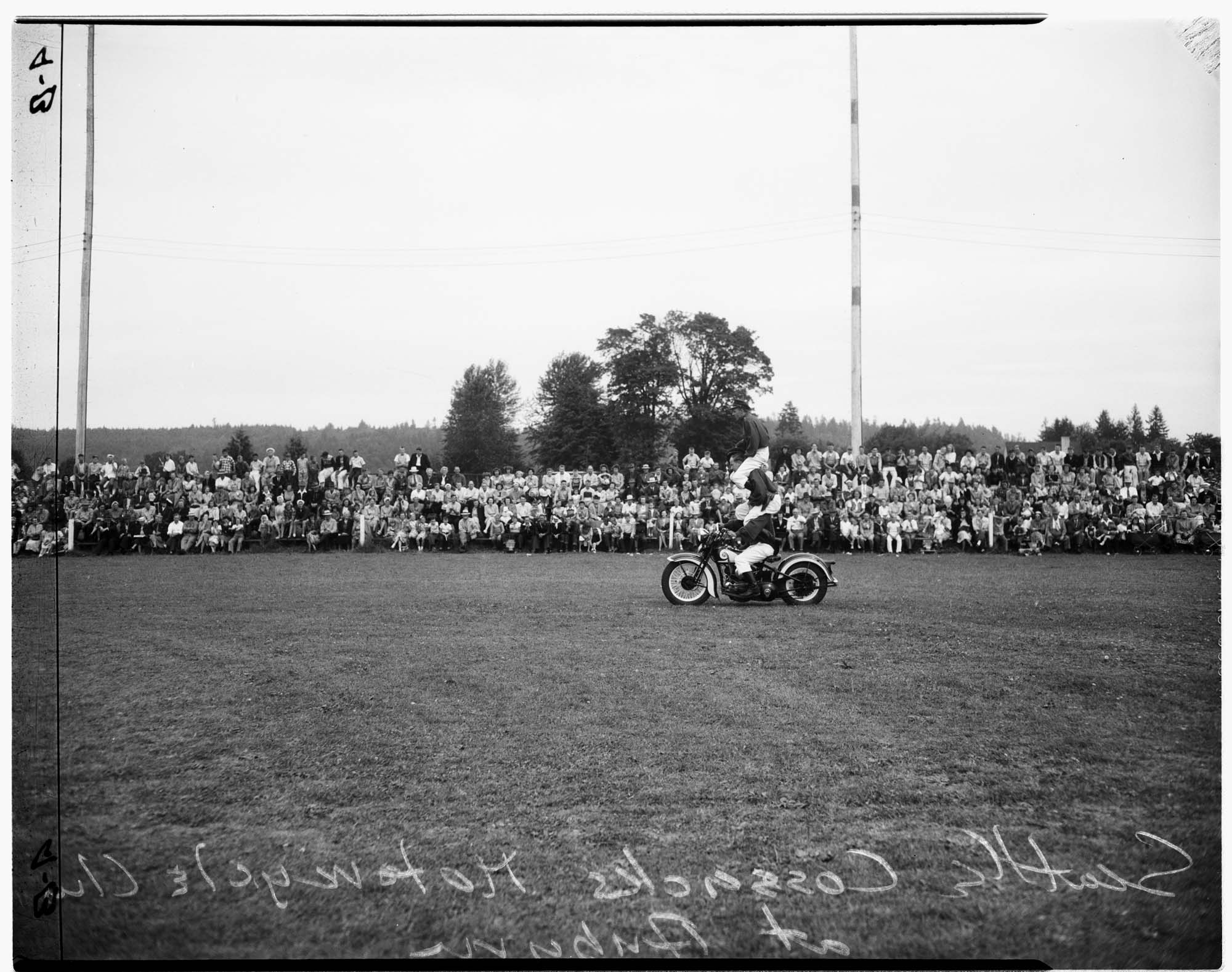 Image of Seattle Cossack member on motorcycle, Auburn, 1948