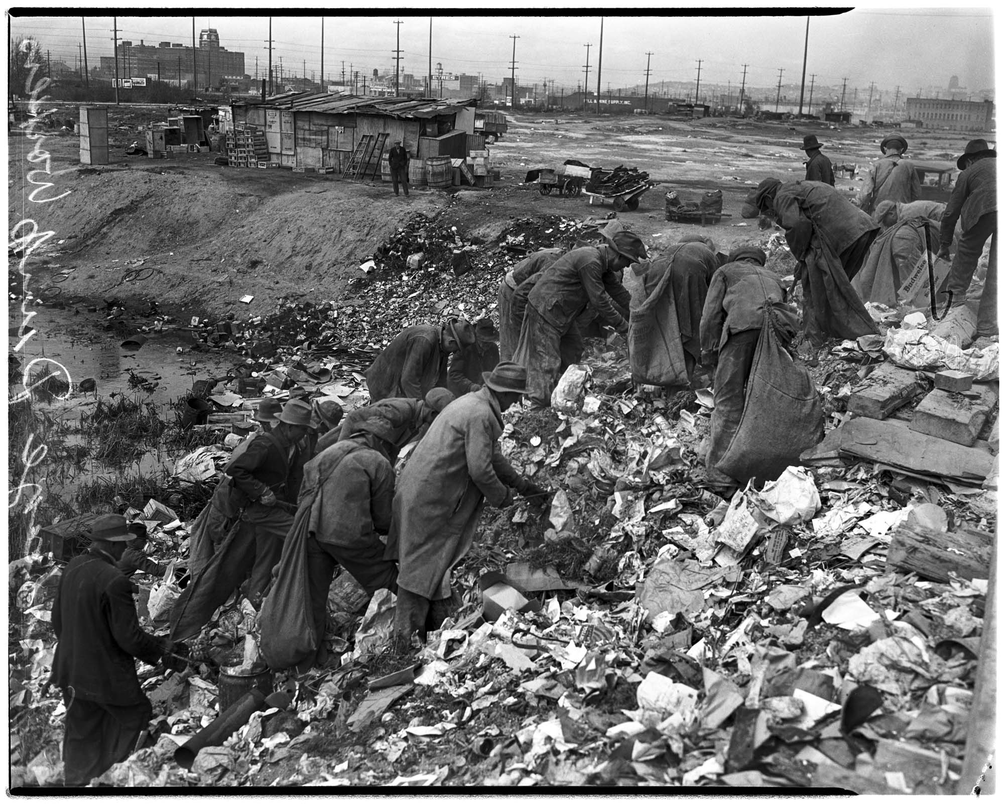 Image of Men scavenging in garbage dump, Seattle, 1937