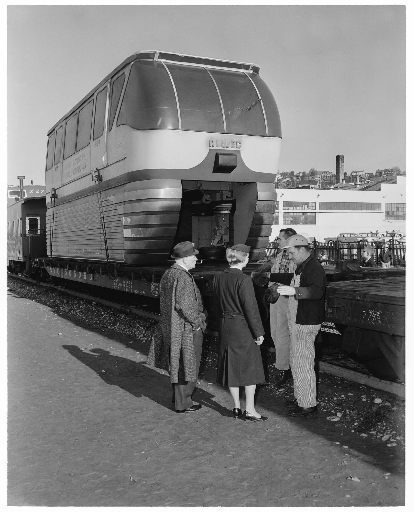 Image of First monorail train arriving at railroad yards, Seattle, 1962