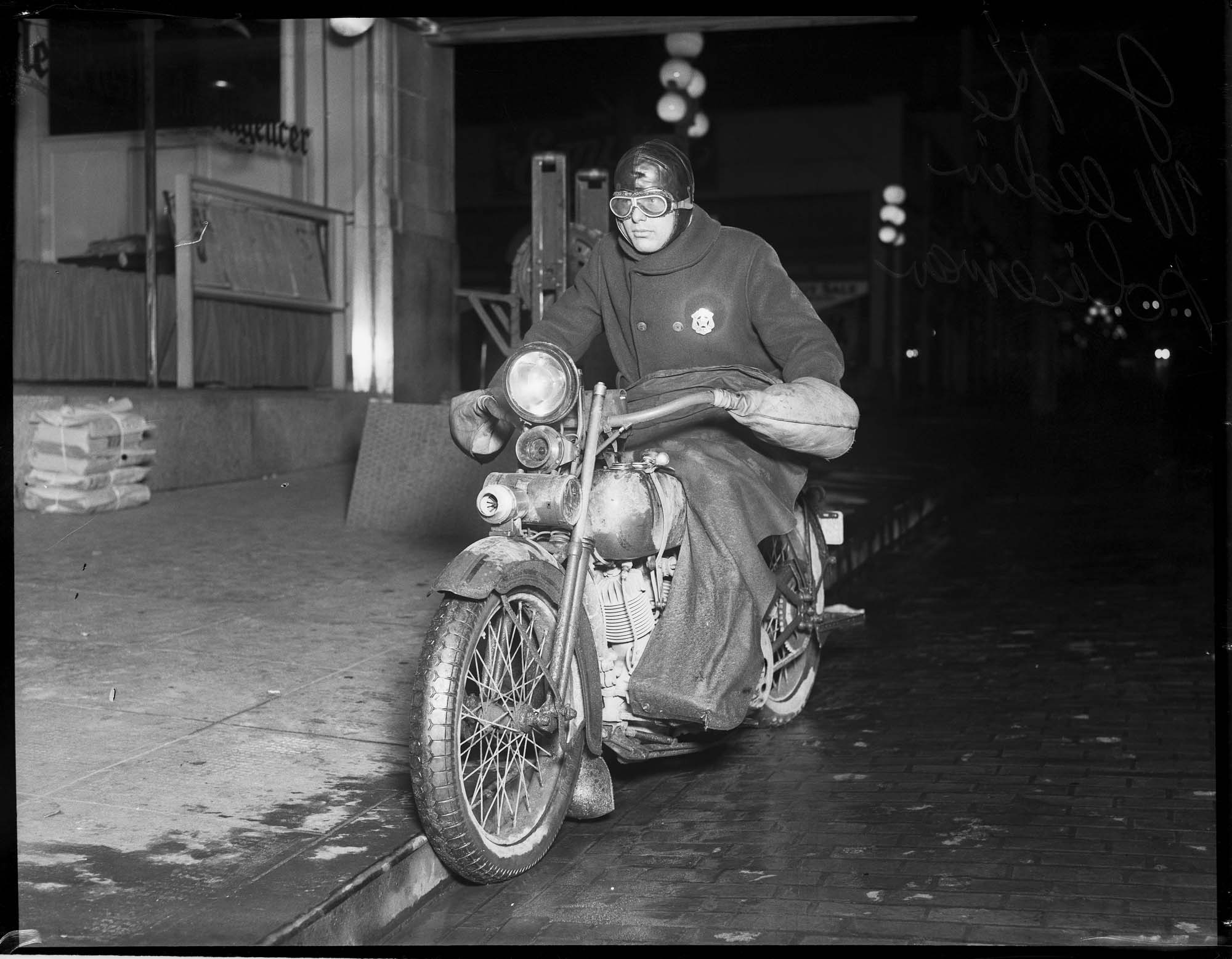 Image of Motorcycle policeman J.K. Weedin, Seattle, March 1928