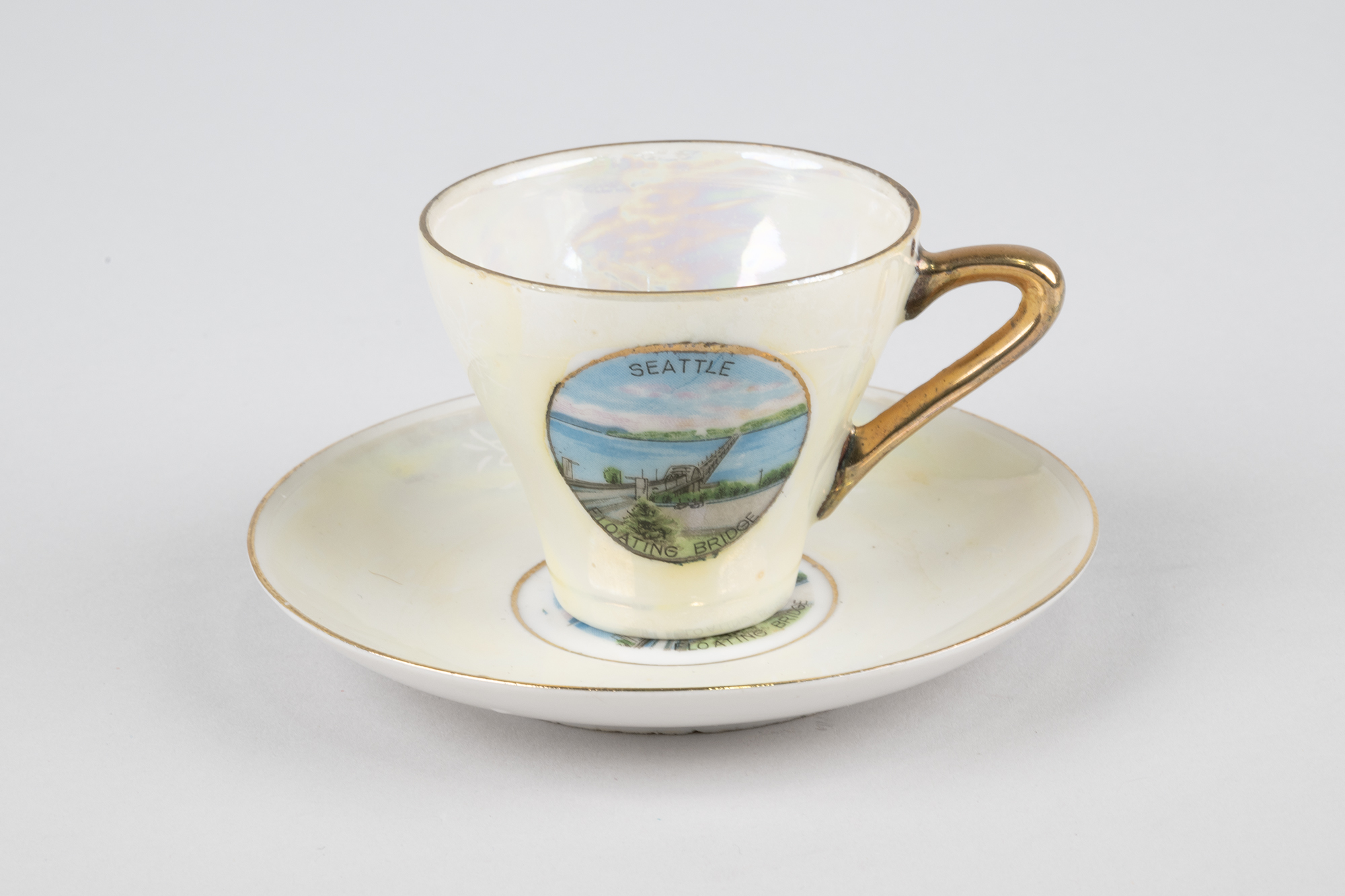 Image of Cup and saucer with images of the Lake Washington Floating Bridge, ca. 1940
