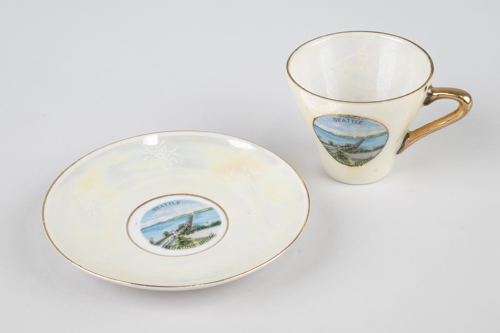 Image of Cup and saucer with images of the Lake Washington Floating Bridge, ca. 1940