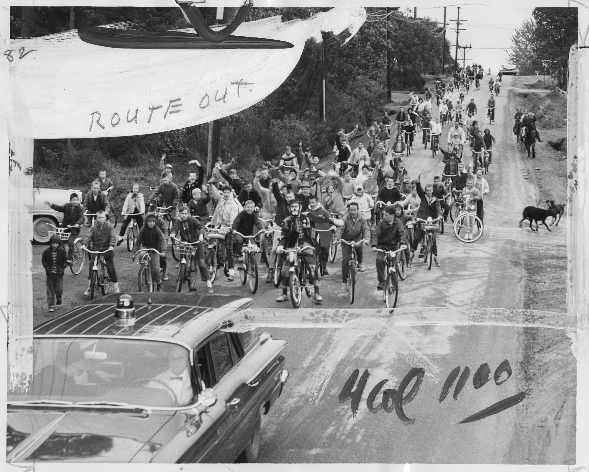 Image of Bicycle riders demonstrating for bike paths, Mercer Island, April 22, 1961