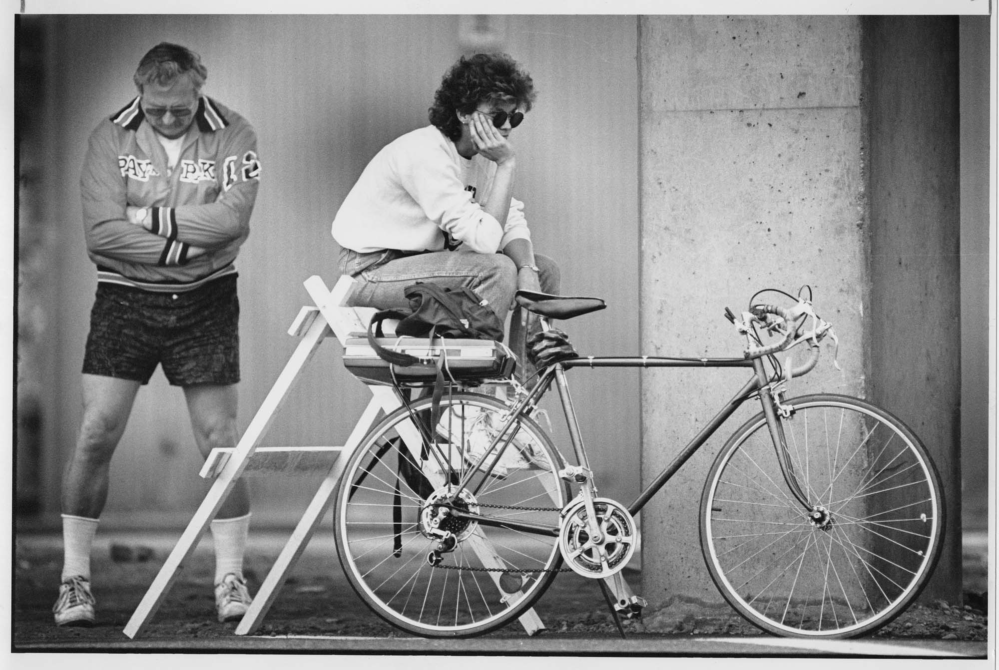 Image of Butch Batt and Di Szillaggi waiting for a West Seattle Bridge shuttle, Seattle, June 8, 1989