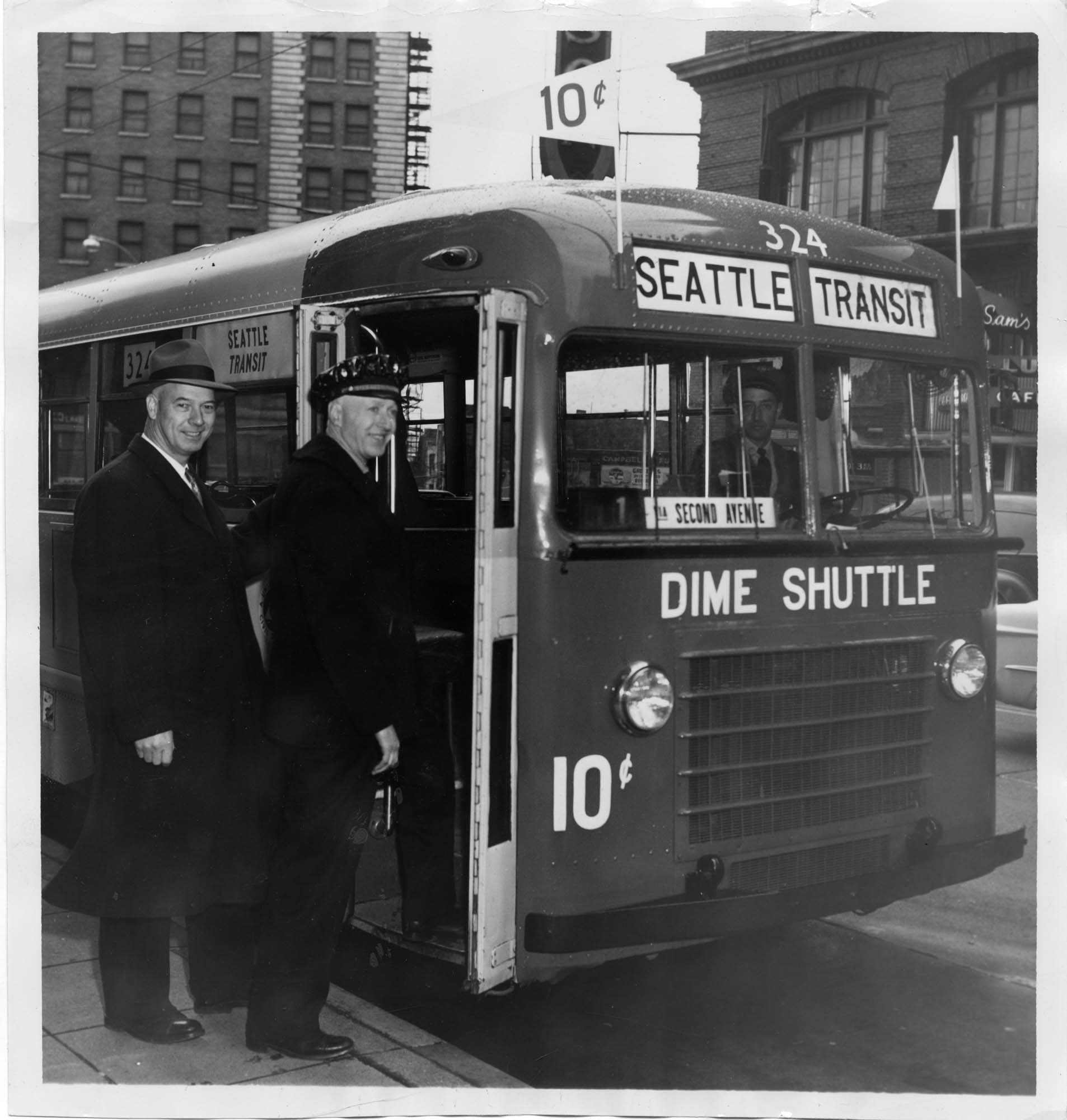 Image of George Moyer and R. A. Cole boarding Dime Shuttle, Seattle, February 16, 1954