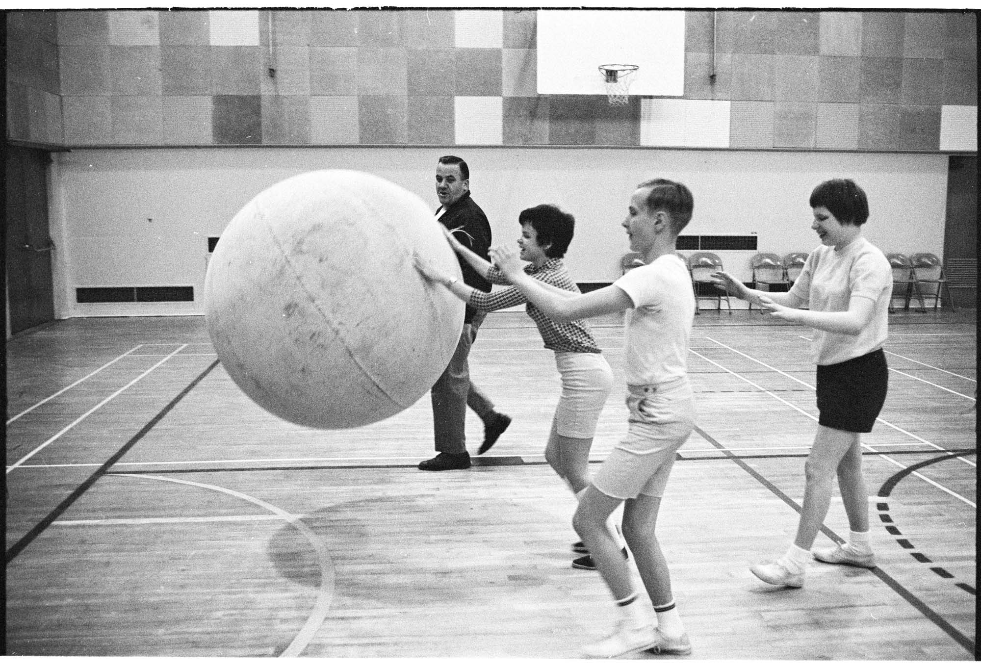 Image of Group playing with a large ball in a PE class for the blind, Seattle,  May 6, 1969