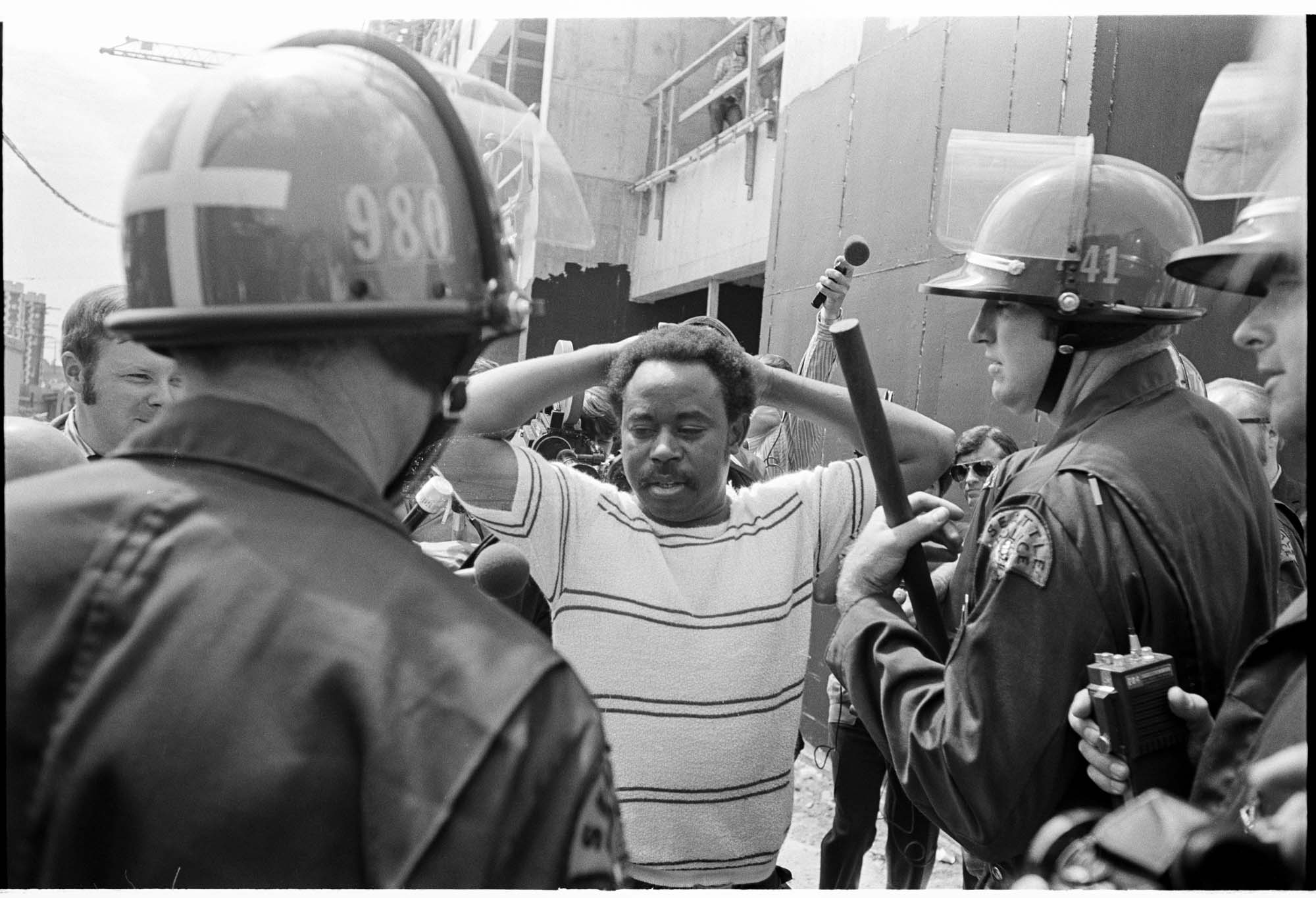 Image of Tyree Scott being arrested at UCWA protest at Seattle Central Community College, June 7, 1972