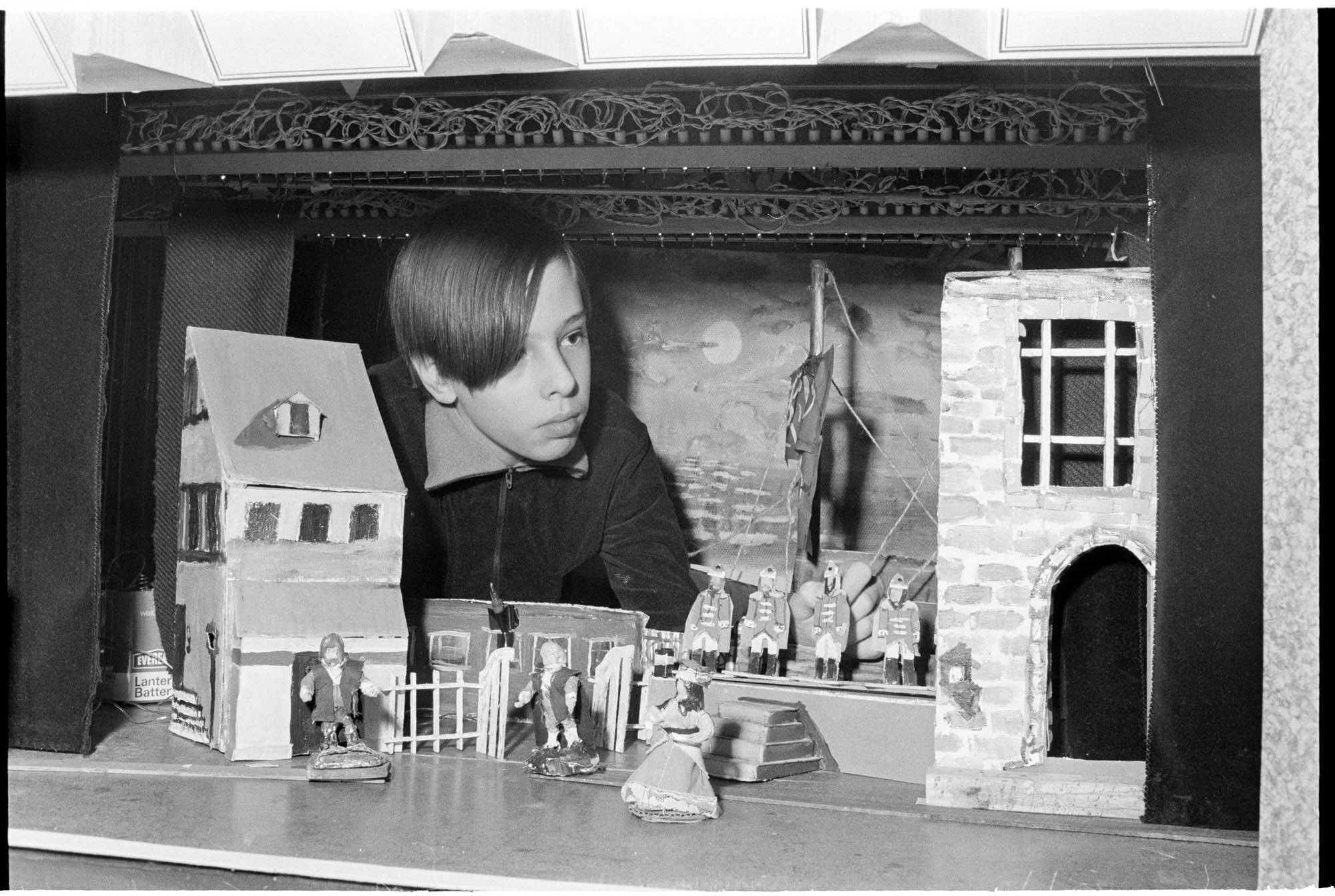 Image of Erhard Rom with model of scene from 