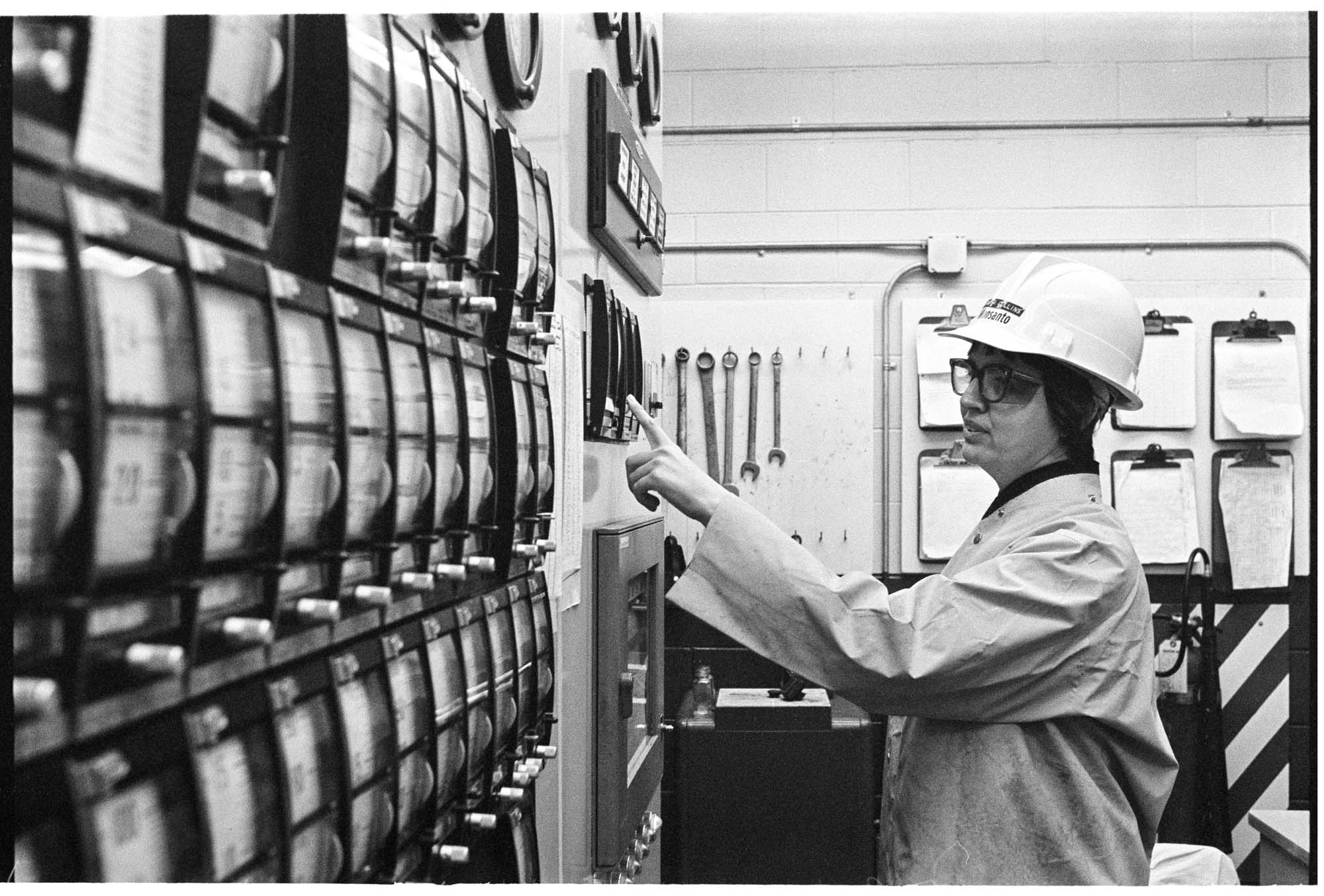 Image of Juanita Collins, chemical engineer, checking production at the Monsanto Corporation plant, Seattle, December 16, 1973