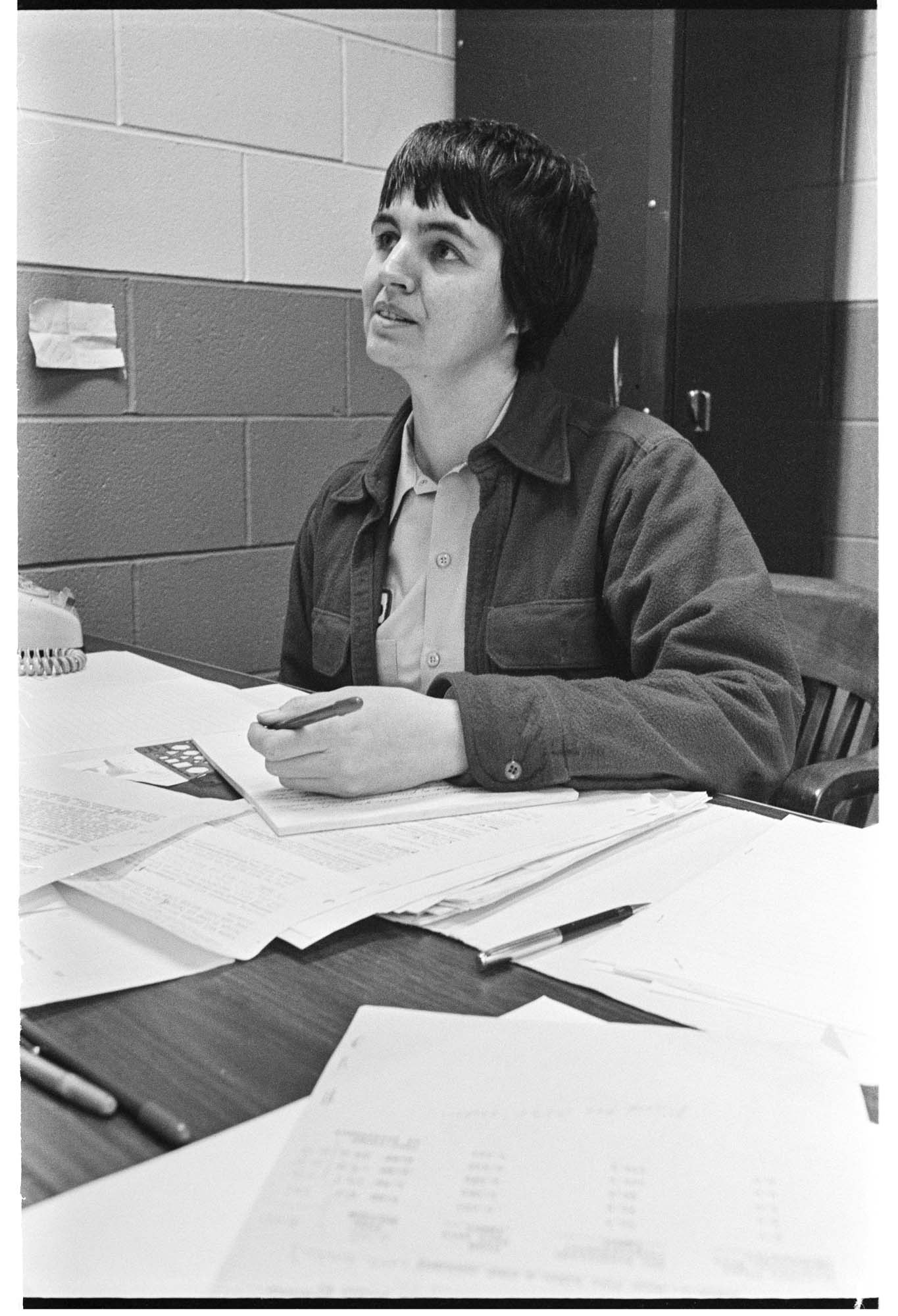 Image of Juanita Collins, chemical engineer, at a desk at the Monsanto Corporation plant, Seattle,  December 16, 1973