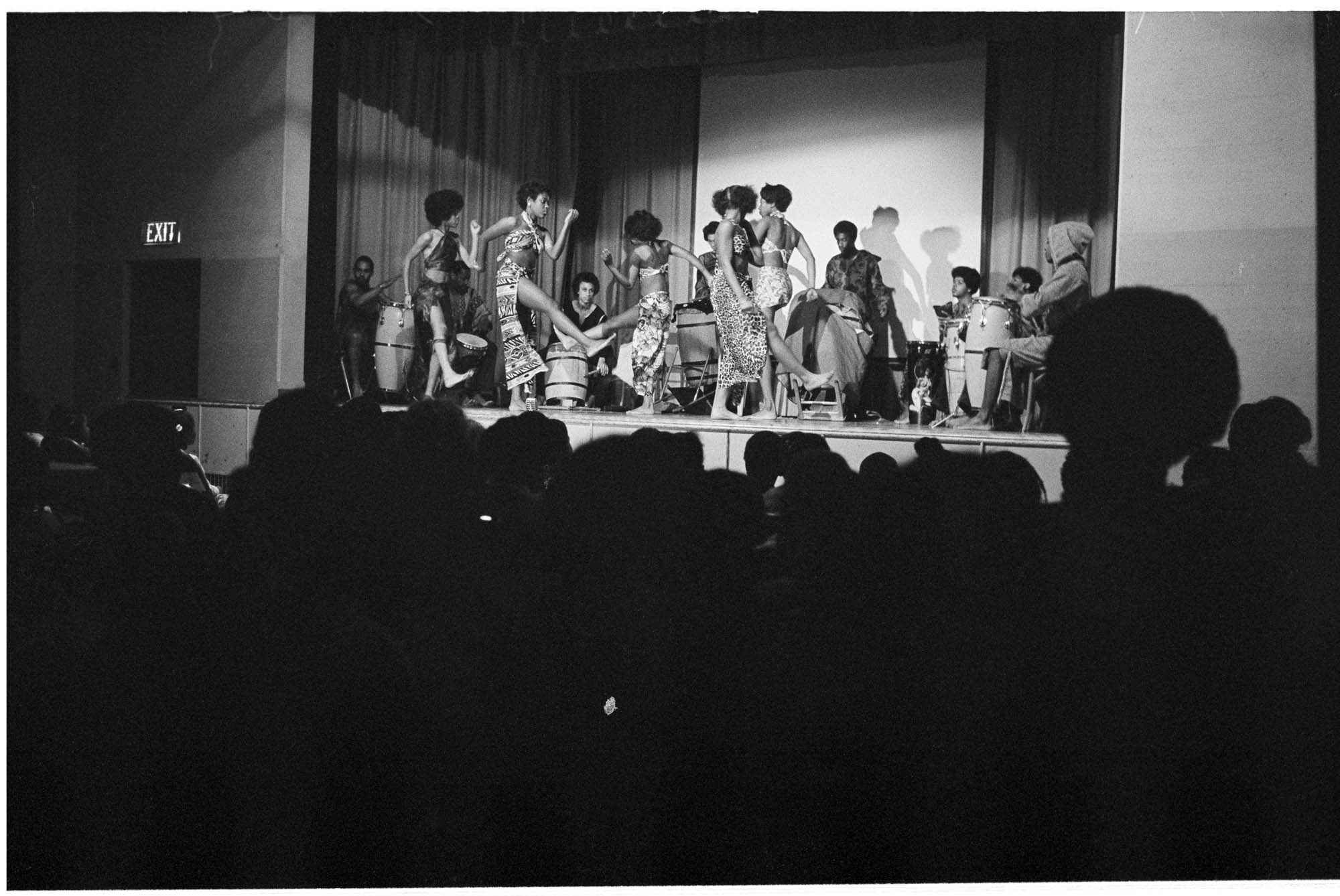 Image of Cleveland High School African Ensemble dancing at Colman Elementary School, Seattle, January 14, 1974