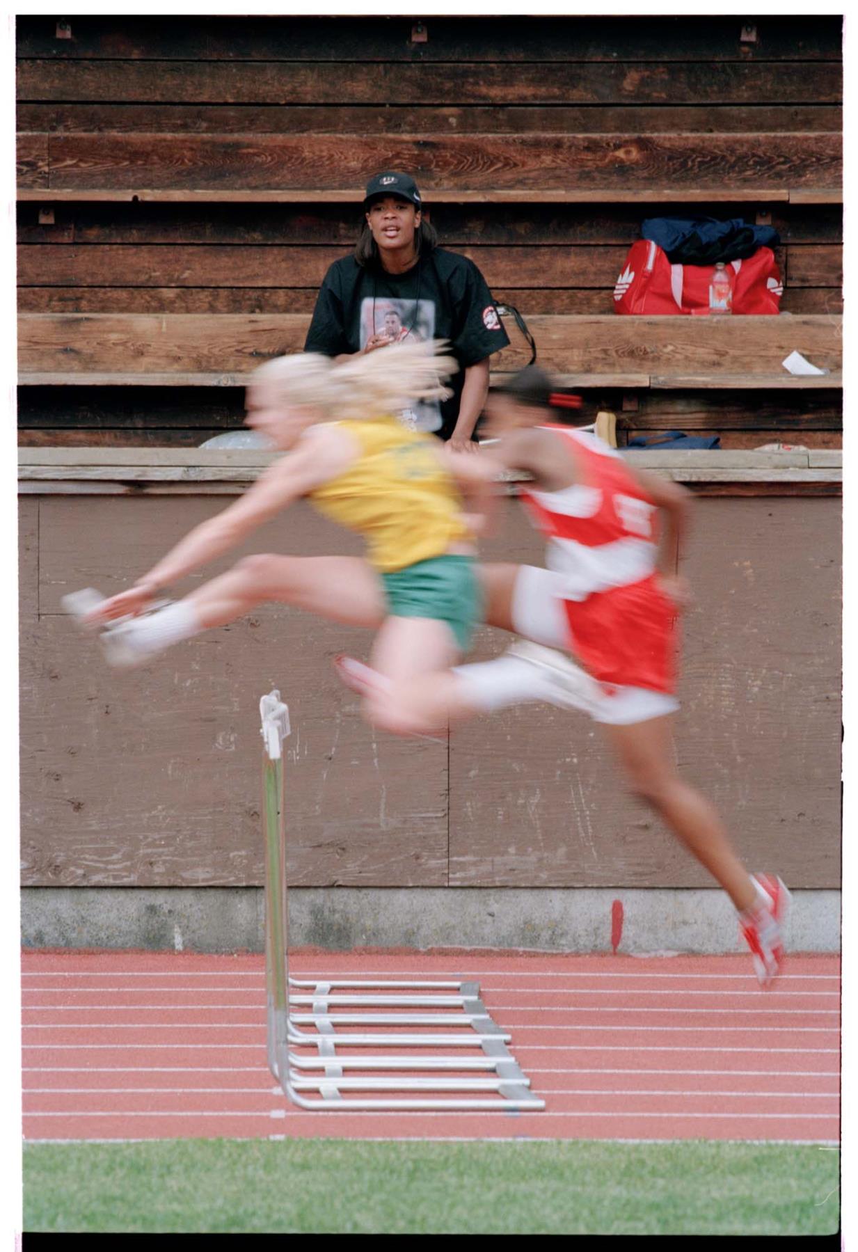 Image of Tara Davis watching Cleveland High School track meet, Seattle, May 2, 1997