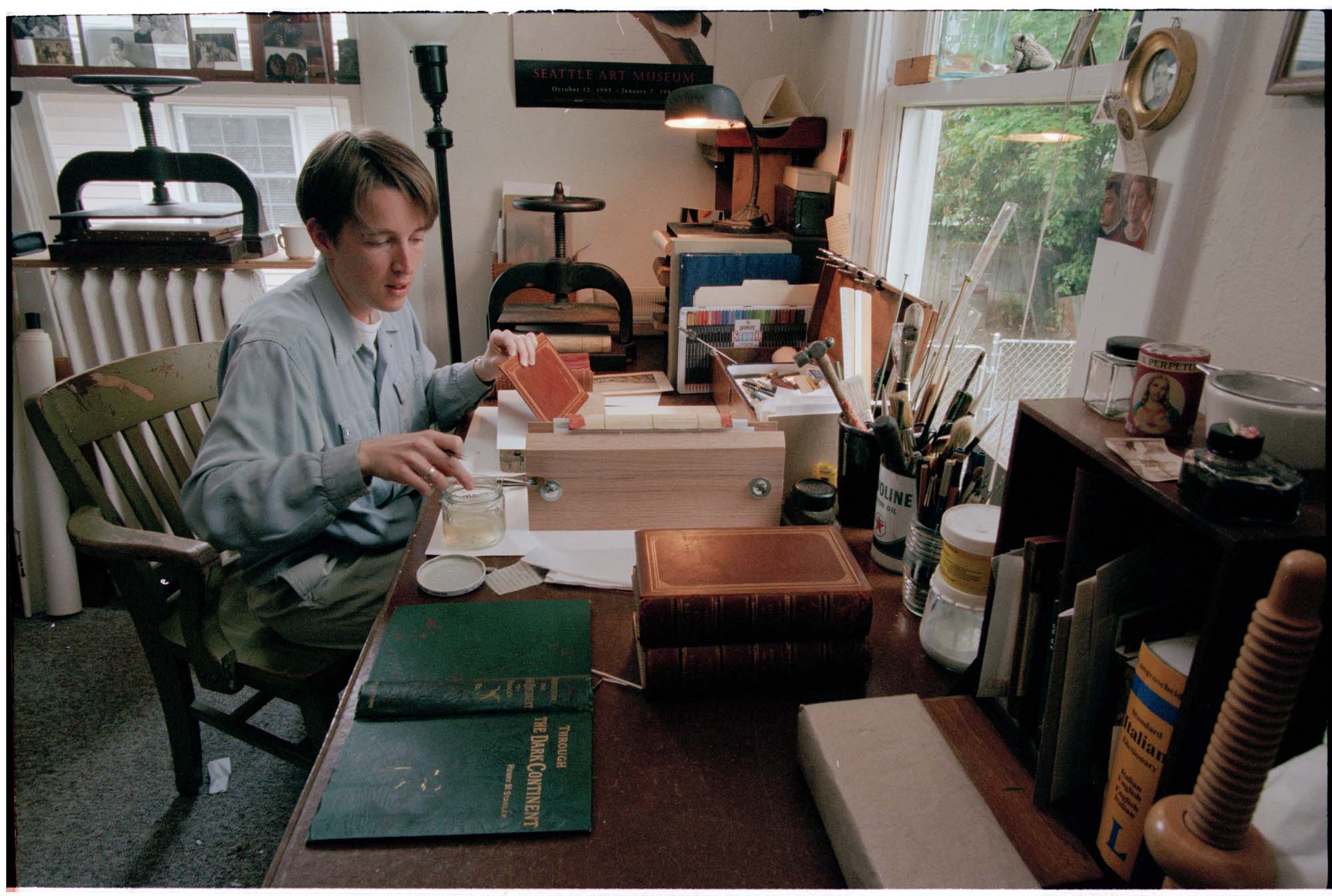 Image of Anne Hillam working in her bookbinding studio, Seattle, May 5, 1997