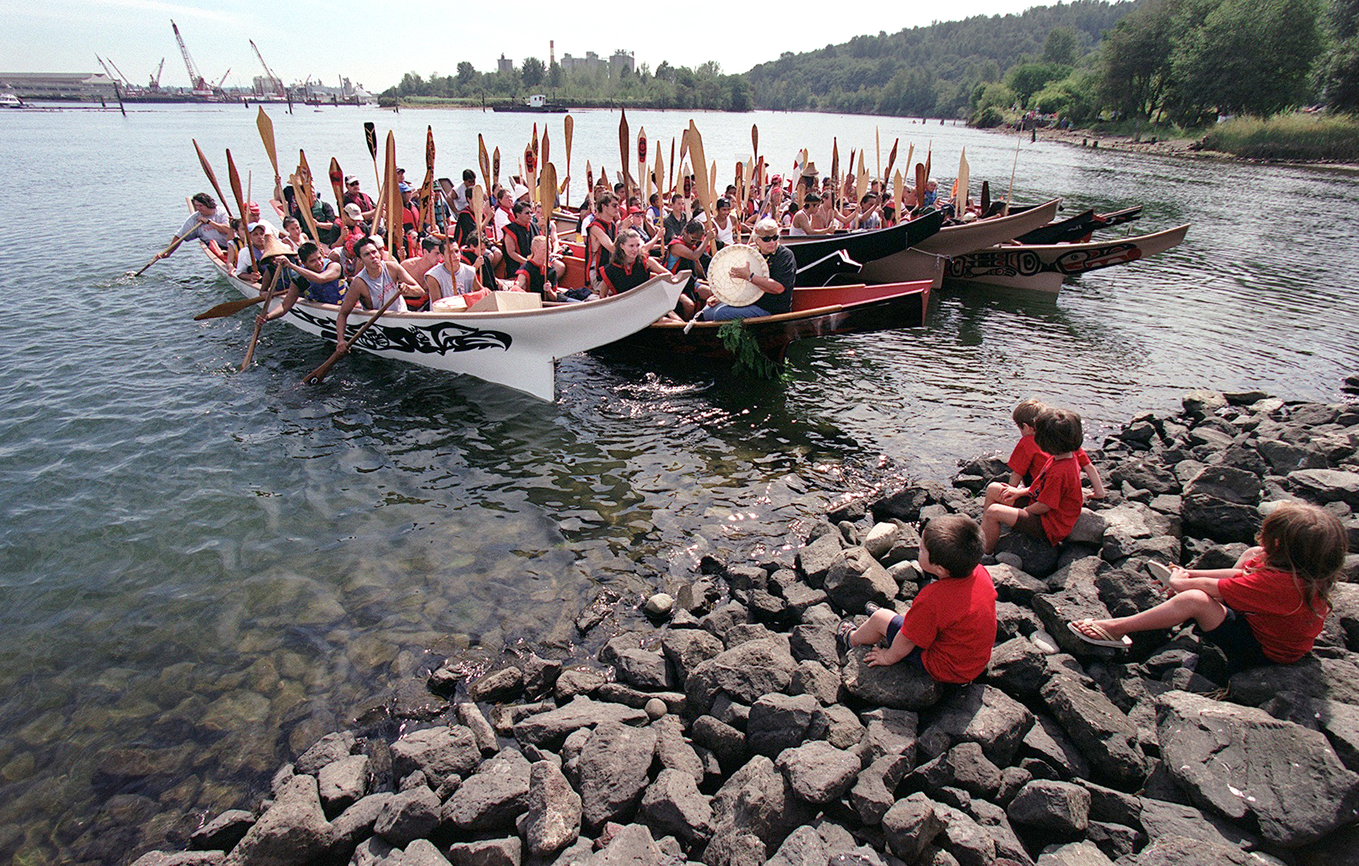 Image of Tribal canoes near historic site of Duwamish longhouse on the Duwamish River, November 9, 2002