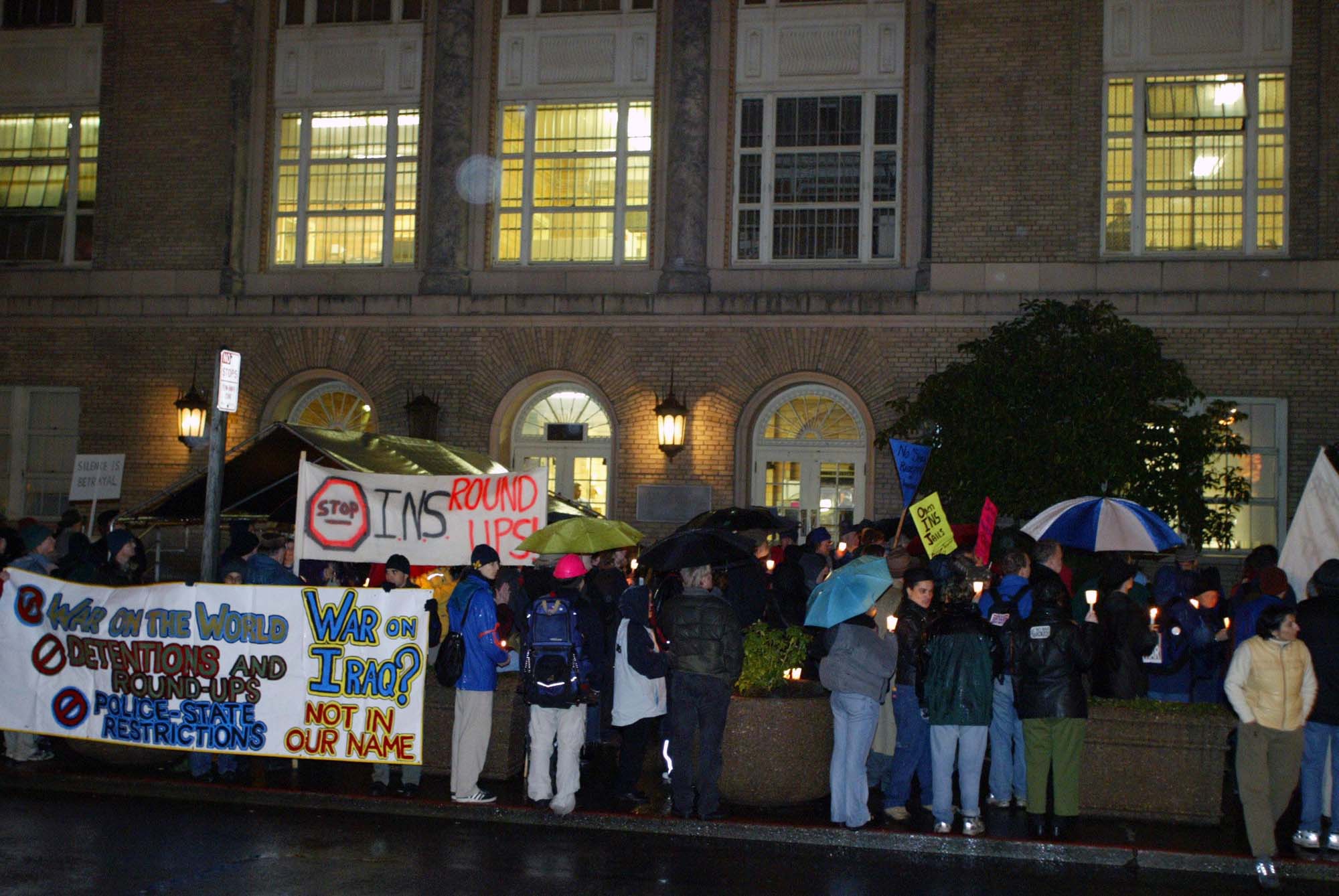 Image of Demonstrators protesting new INS policies at INS detention center, Seattle, January 13, 2003