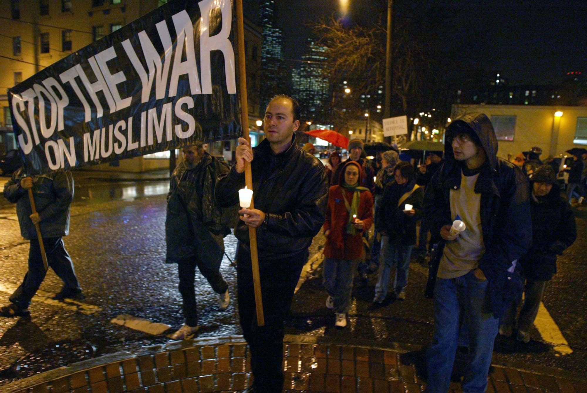Image of Demonstrators protesting new INS policies, Seattle, January 13, 2003