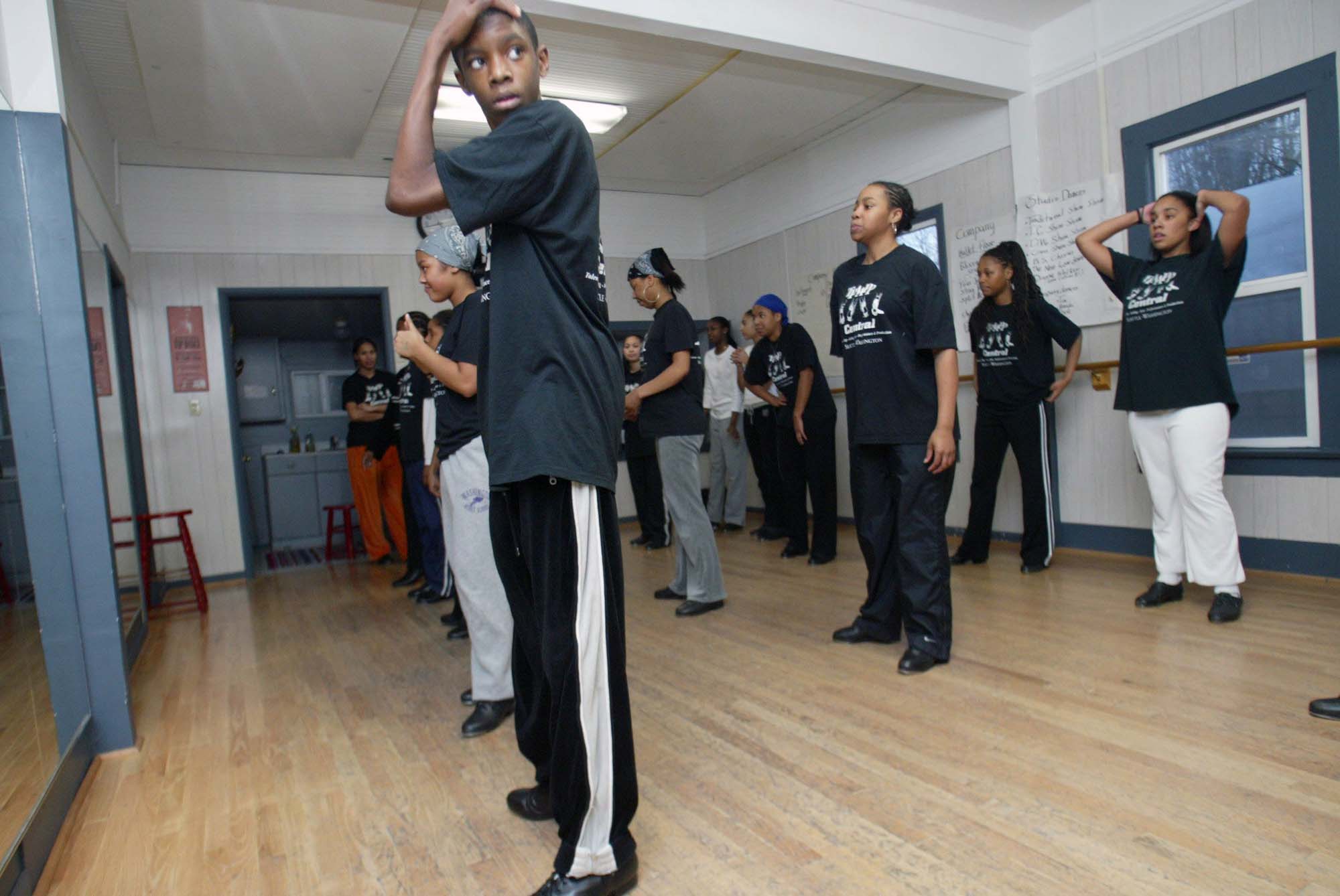 Image of Tap dance students in front of mirror TTAAPP Central, Seattle, January 2003