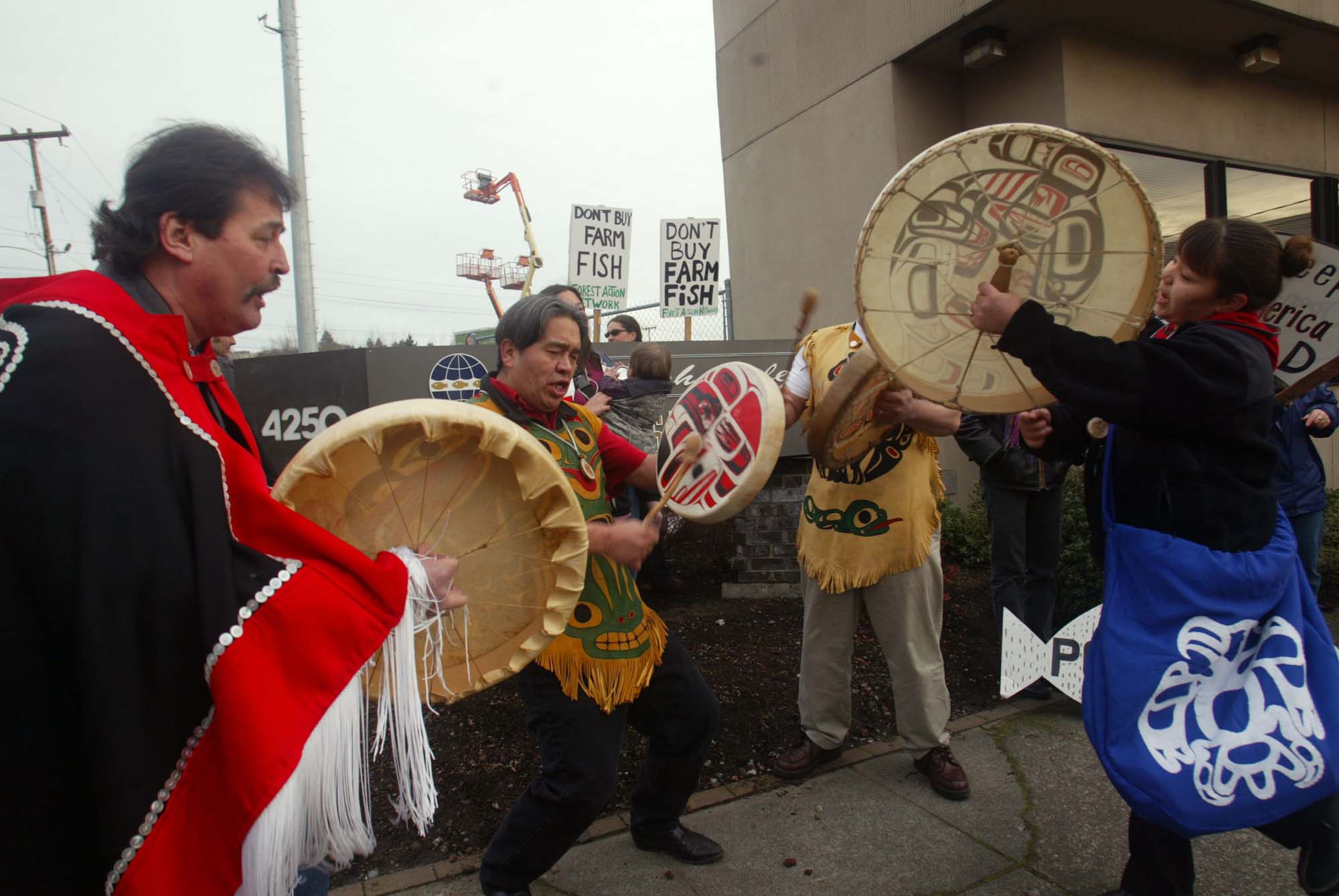 Image of Haida drummers protesting salmon farming practices, Seattle, January 15, 2003