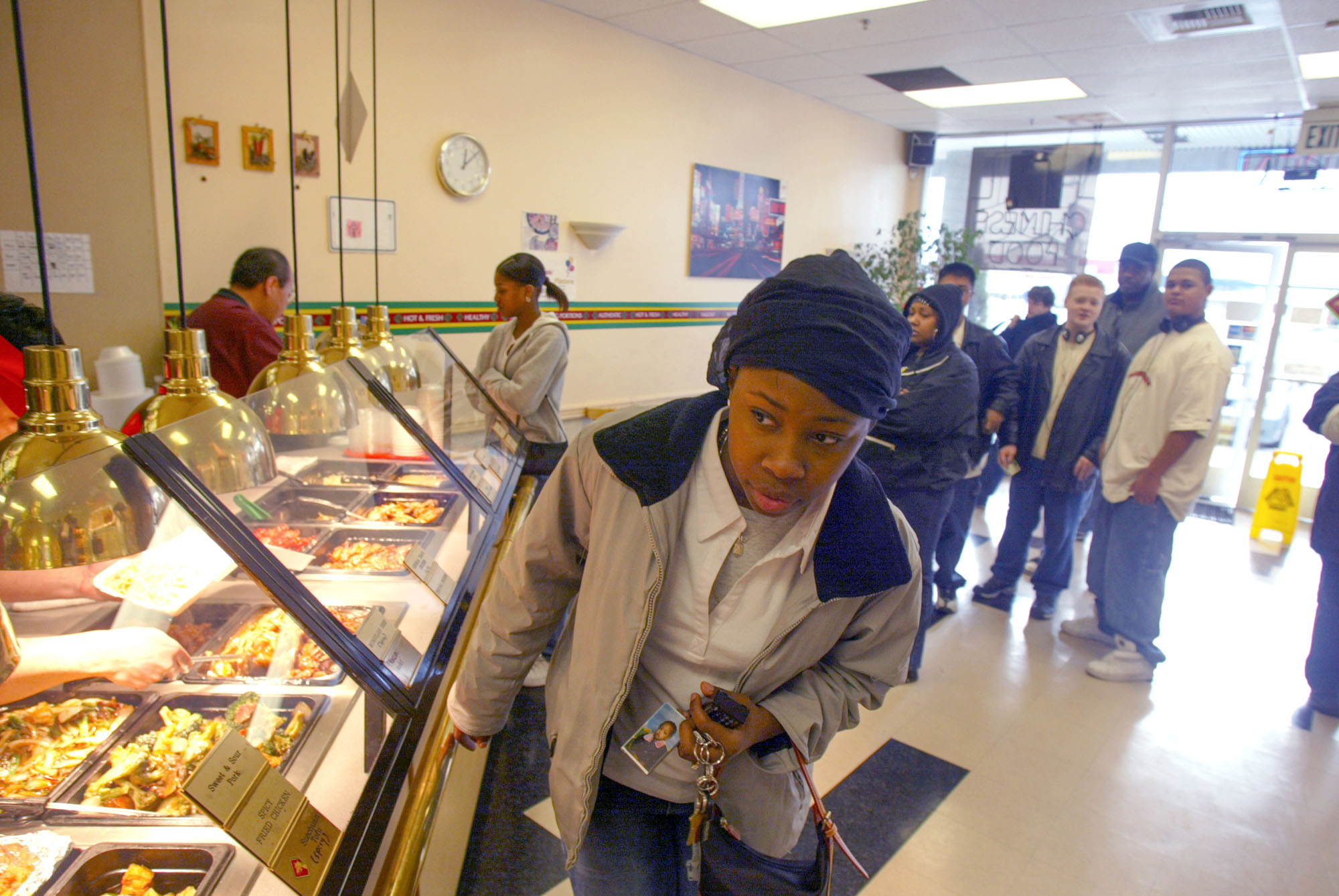Image of De'Andra Charleston at the Magic Dragon fast-food restaurant, Seattle, January 16, 2003