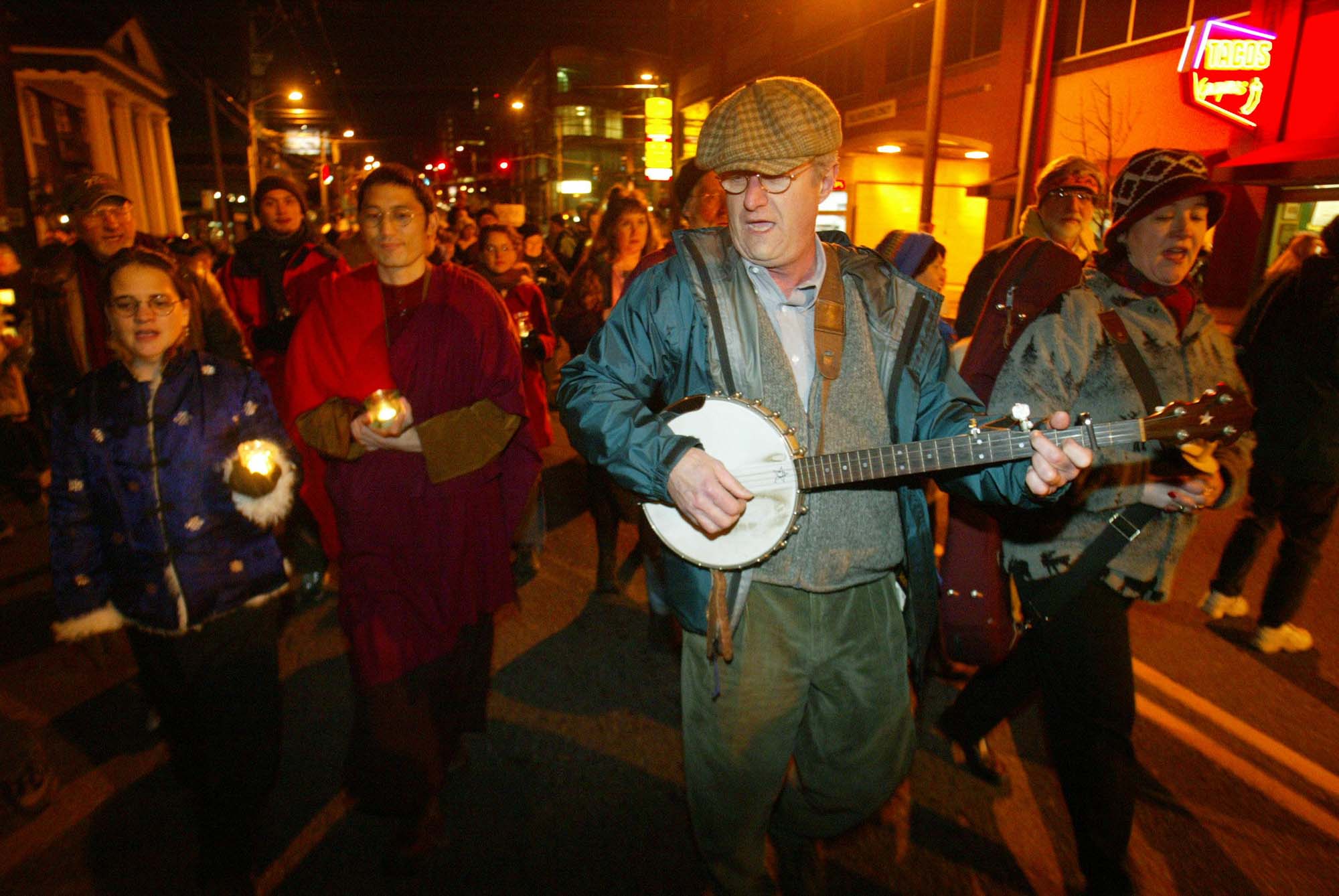 Image of Anti-war protesters marching on Broadway, Seattle, January 17, 2003