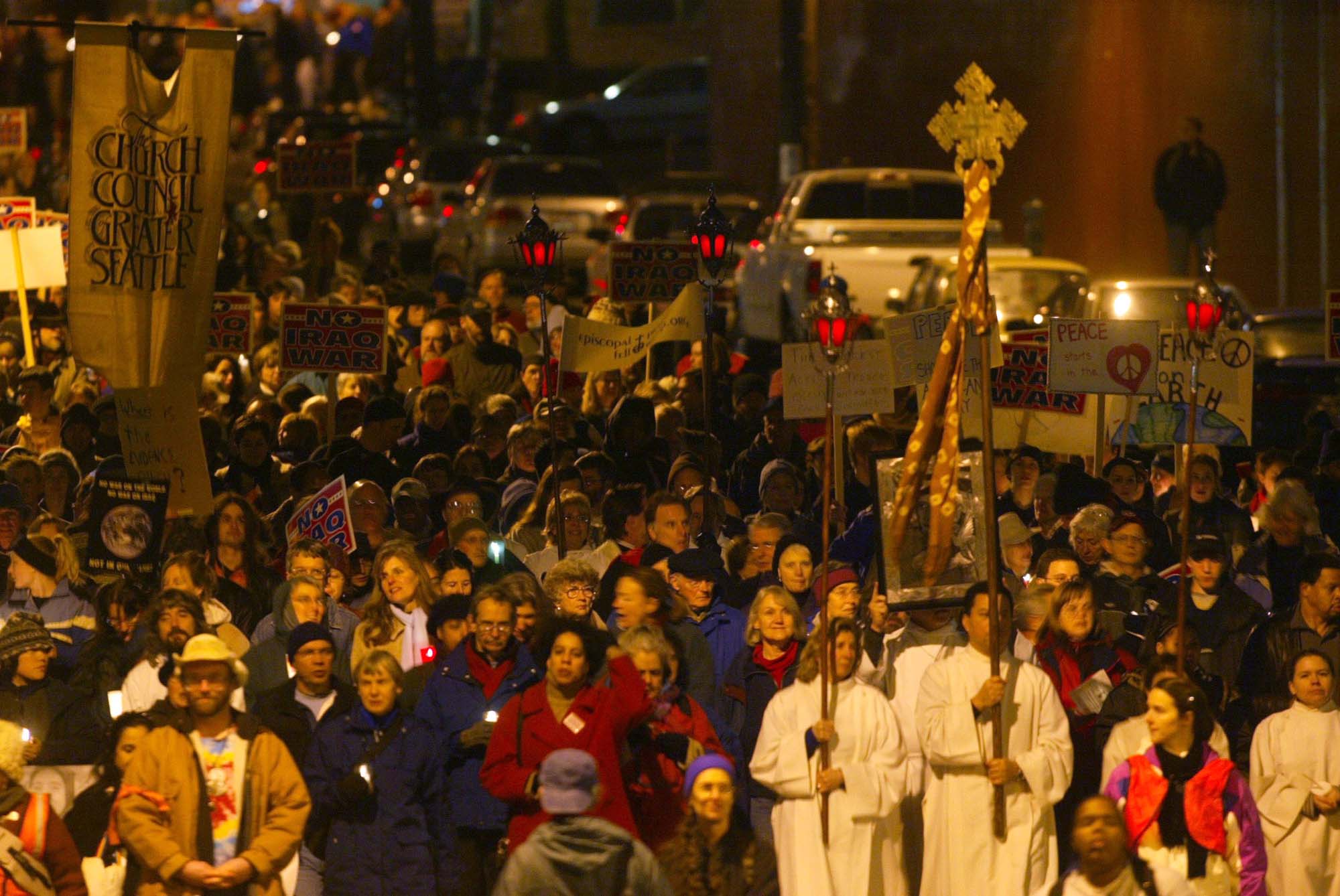 Image of Anti-war protesters marching on Broadway, Seattle, January 17, 2003
