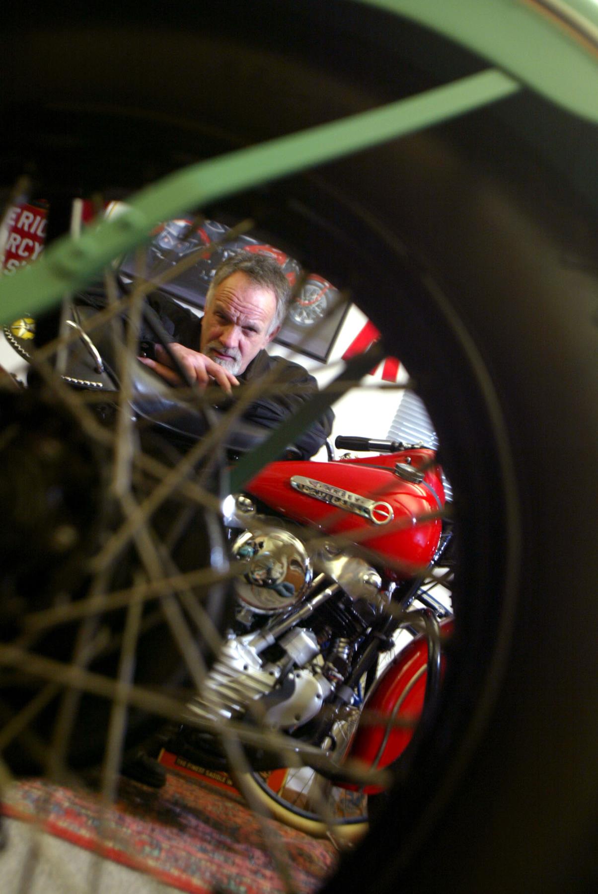 Image of Marty Maloney with Harley Davidsons at the Pioneer Museum of Motorcycles, Tacoma, January 27, 2003