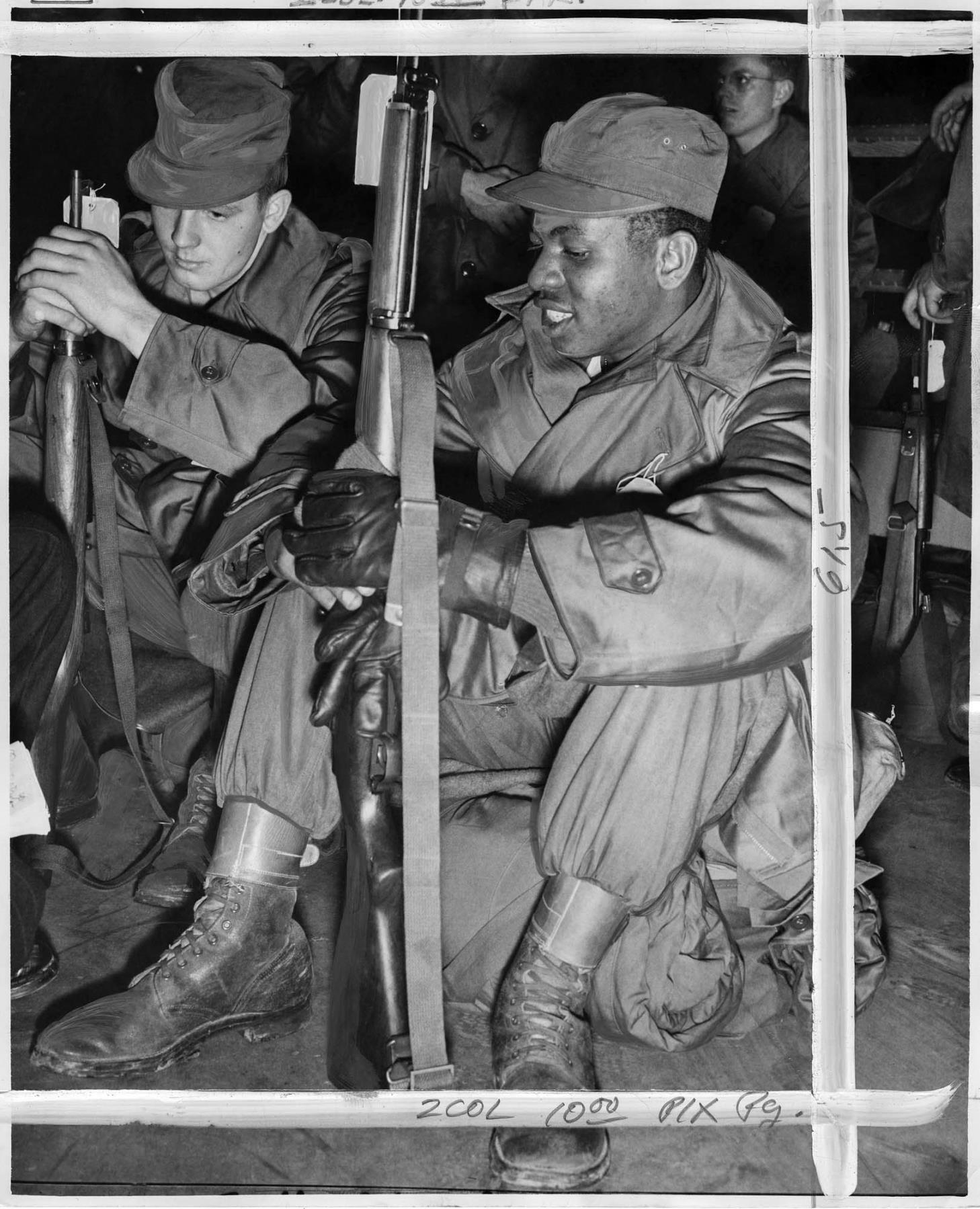 Image of Two soldiers at Fort Lawton before transfer to Korea, November 29, 1950