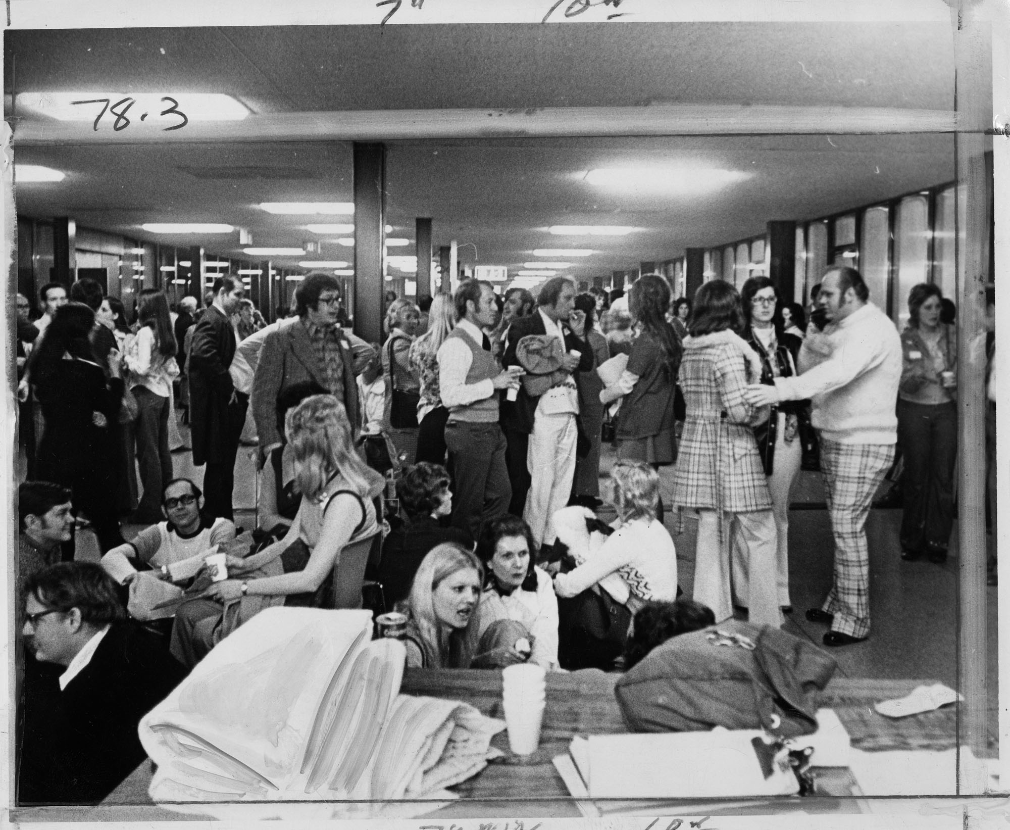 Image of Adoptive and foster parents waiting for children from Vietnam, Sea-Tac, April 6, 1975