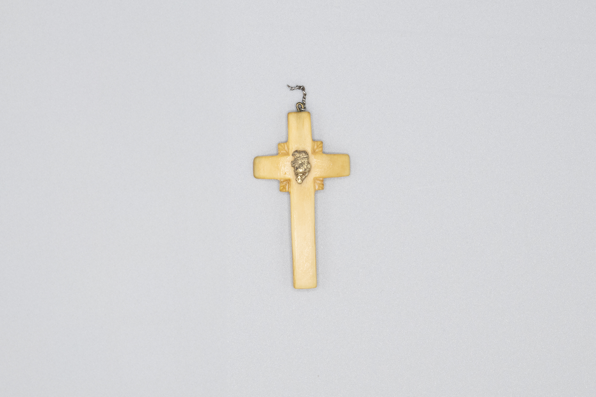 Image of Ivory cross pendant with gold nugget from the AYPE, 1909