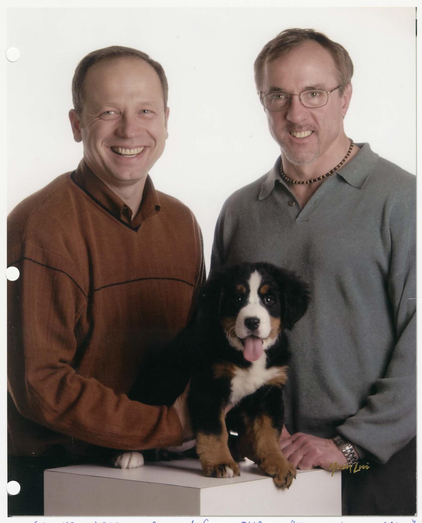 Image of Mike Schaefer, Ric Weiland, and their dog Kofi, circa 2002