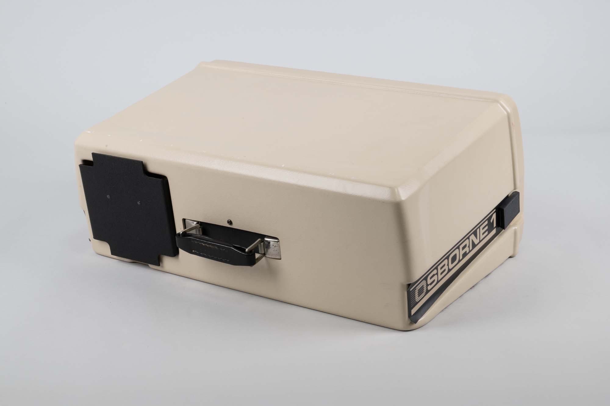 Image of Osborne 1 portable computer, with manuals and accessories, ca. 1981