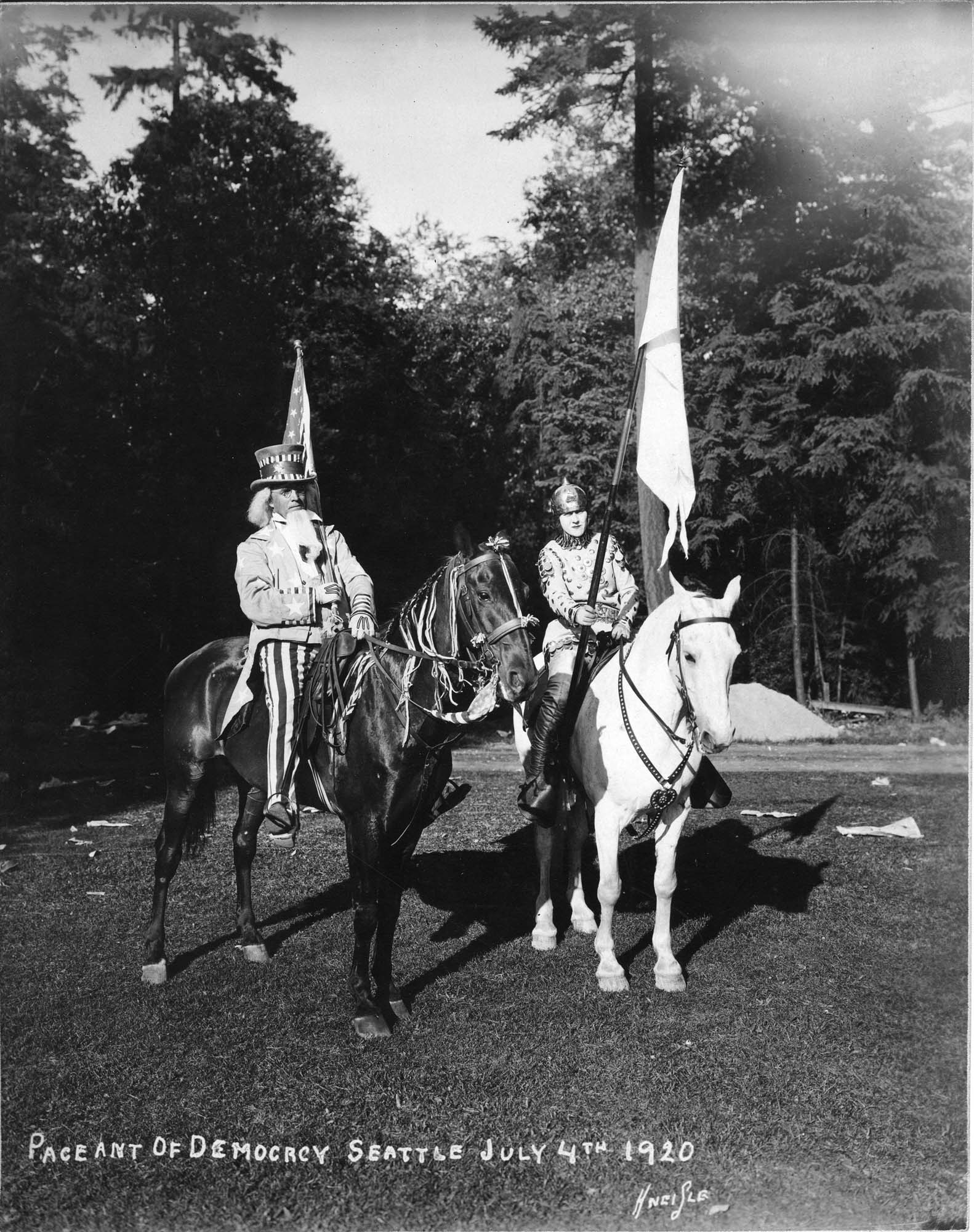 Image of Performers on horseback dressed as Uncle Sam and Joan of Arc for Independence Day celebration, Woodland Park, Seattle, July 5, 1920