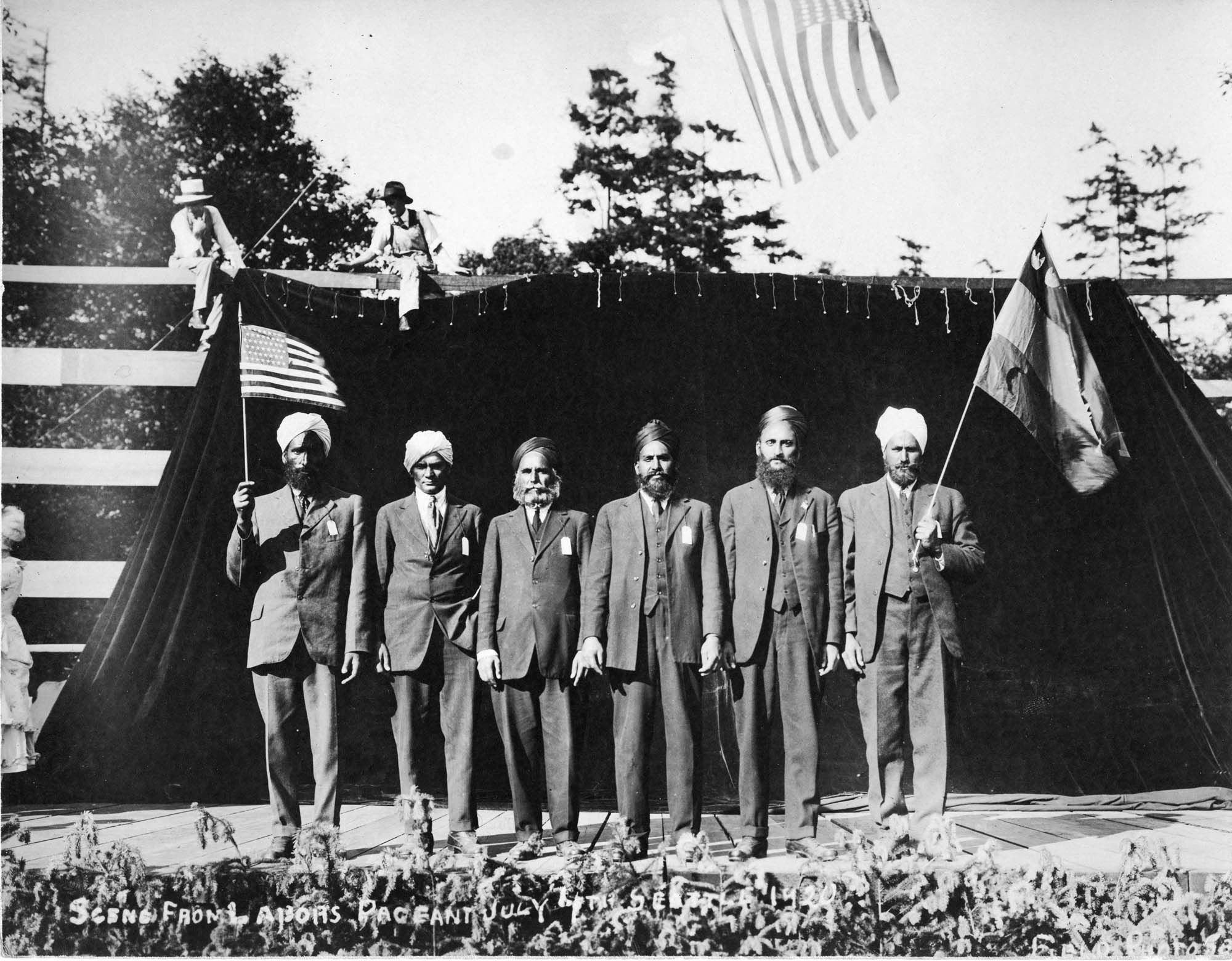 Image of Six men in turbans performing in the 