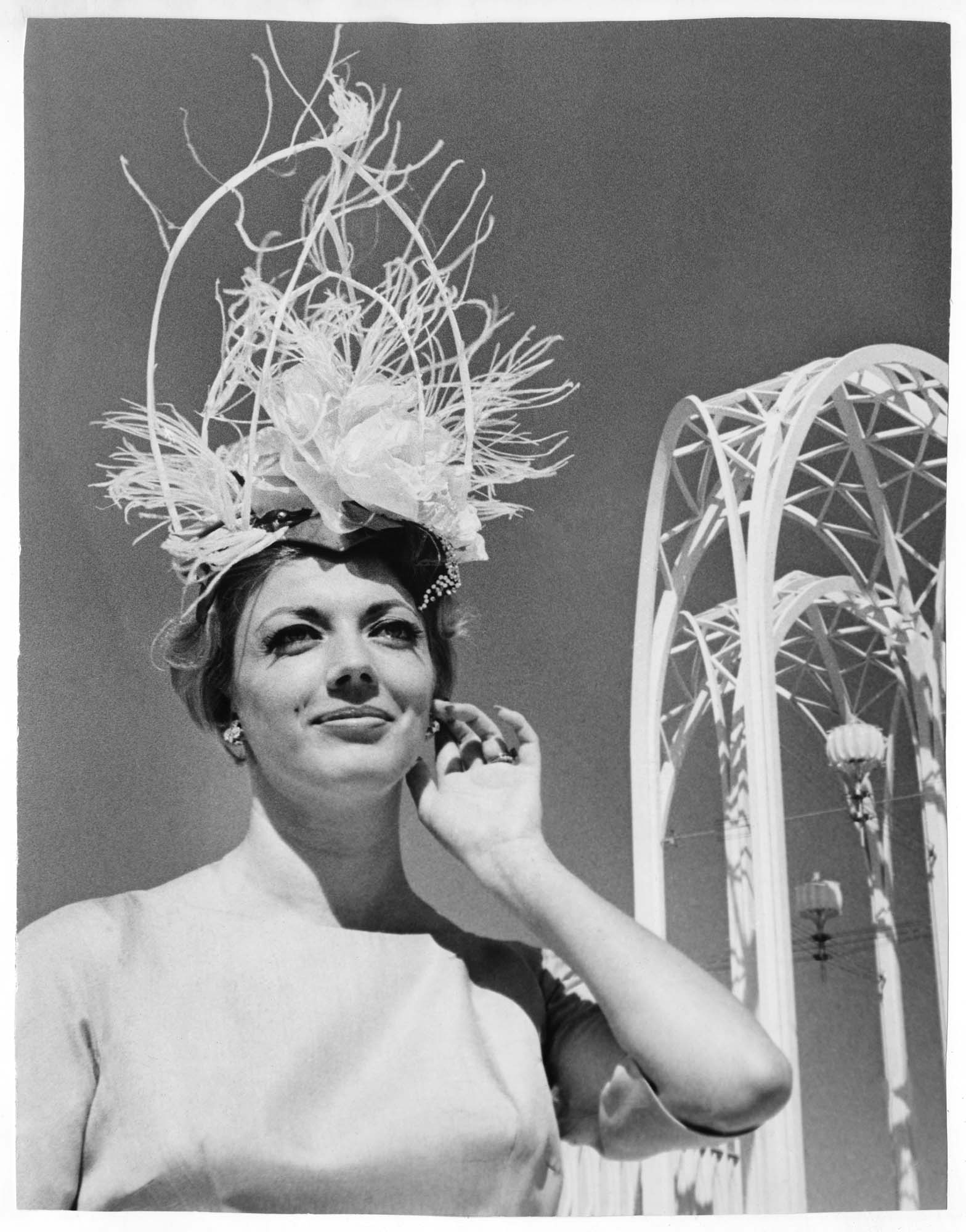Image of Donna Rydberg modeling a John Eaton hat, Seattle, 1962