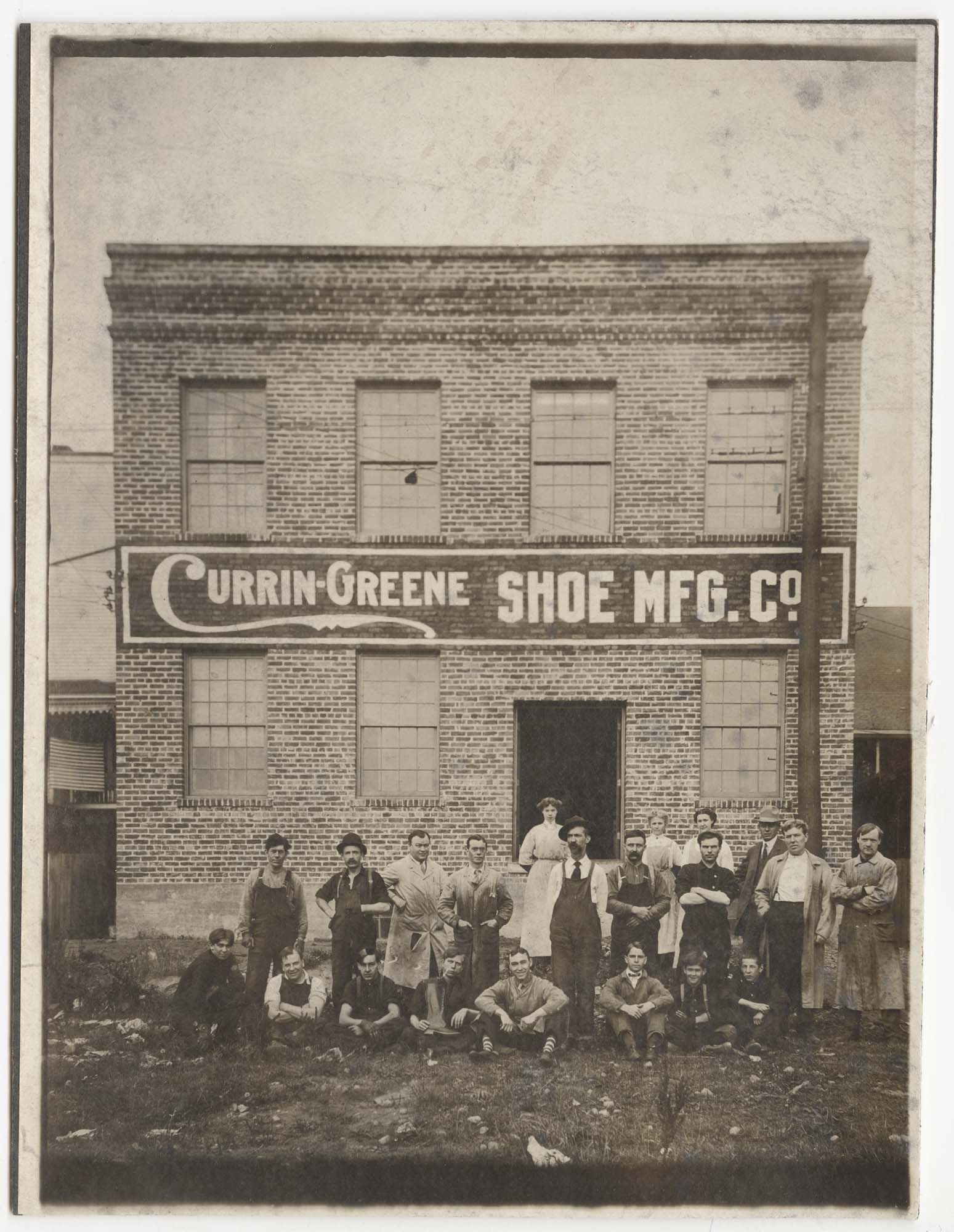 Image of Workers standing outside the Currin-Greene Shoe Manufacturing Company, Seattle, 1917