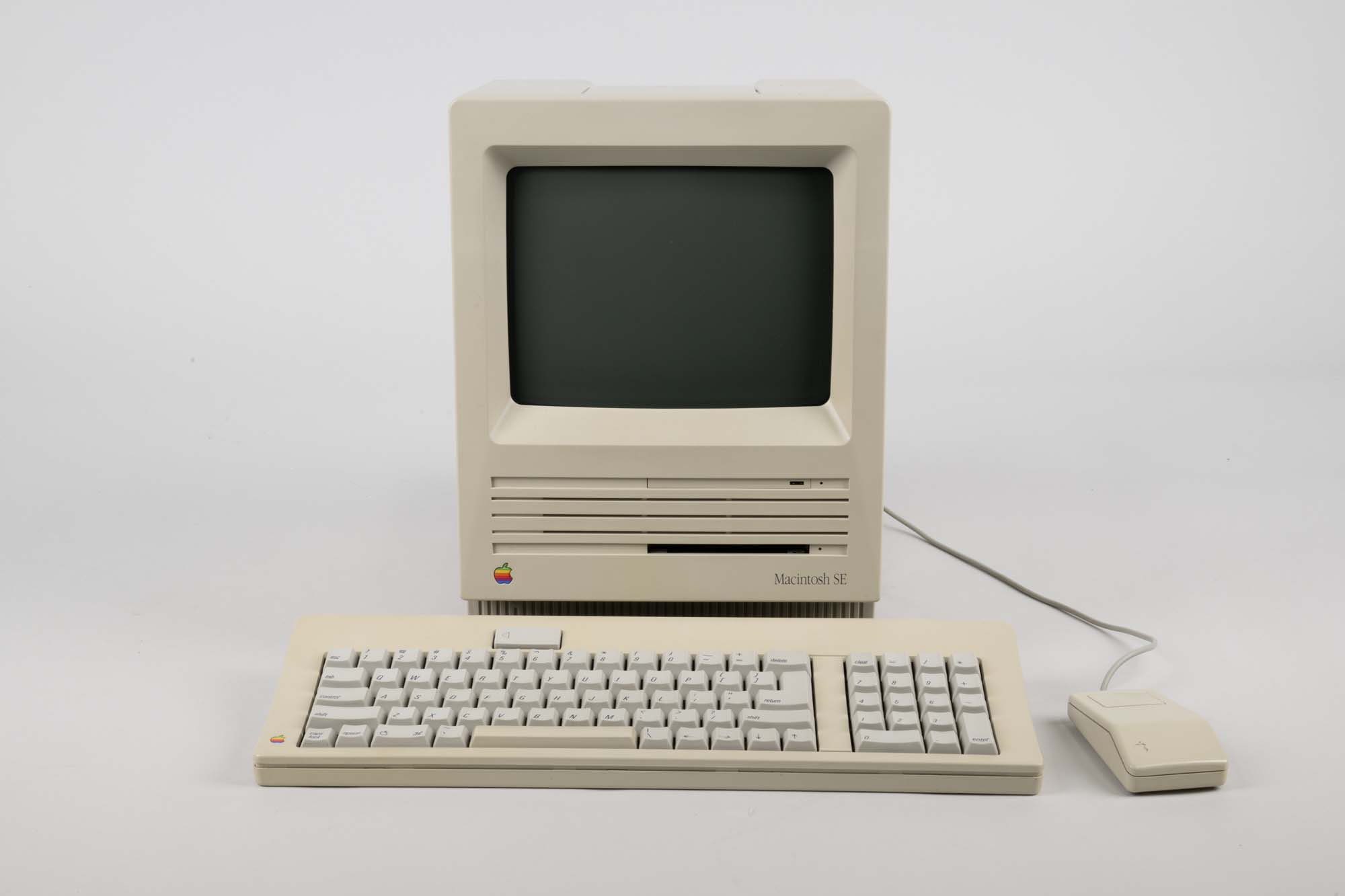 Apple Macintosh SE computer with keyboard and mouse, ca